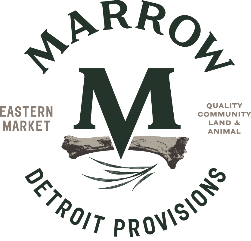 Marrow Detroit Provisions logo featuring a large letter M with a bone underneath and text 'Eastern Market' and 'Quality Community Land & Animal' around it.