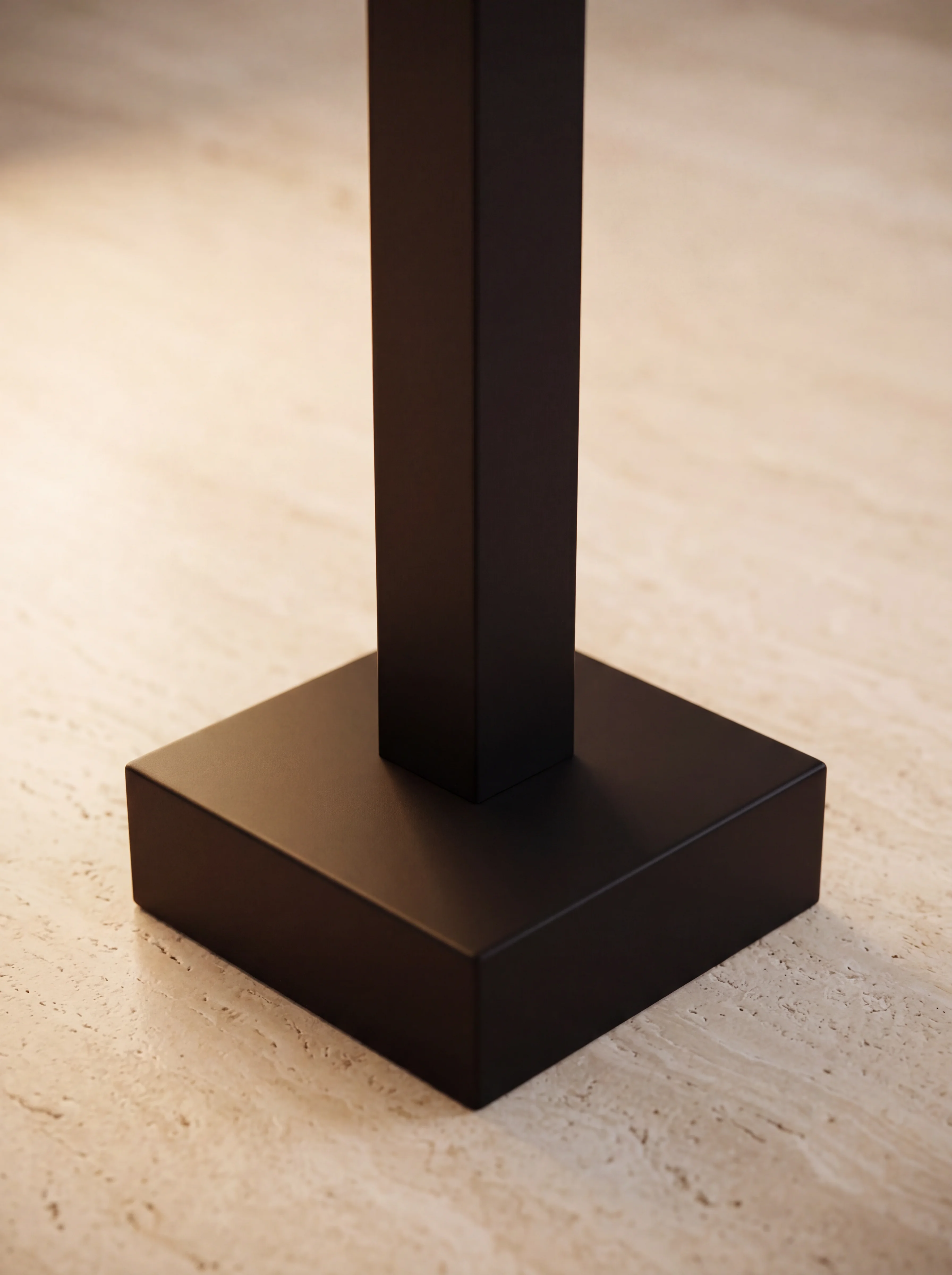 Noir bath filler detail — matte black square spout arm and handheld shower