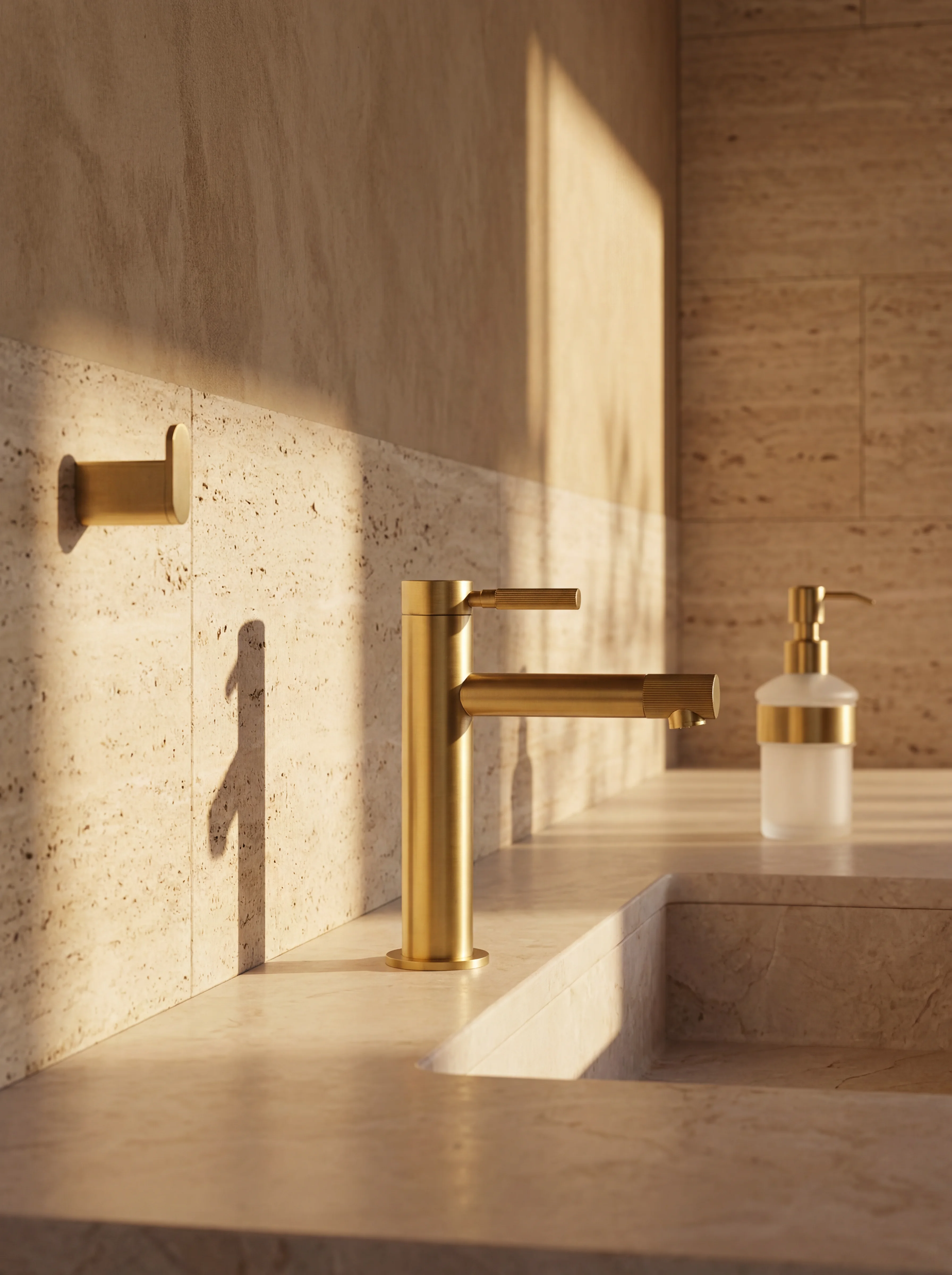 Vermeil basin tap in brushed gold on a bathroom vanity