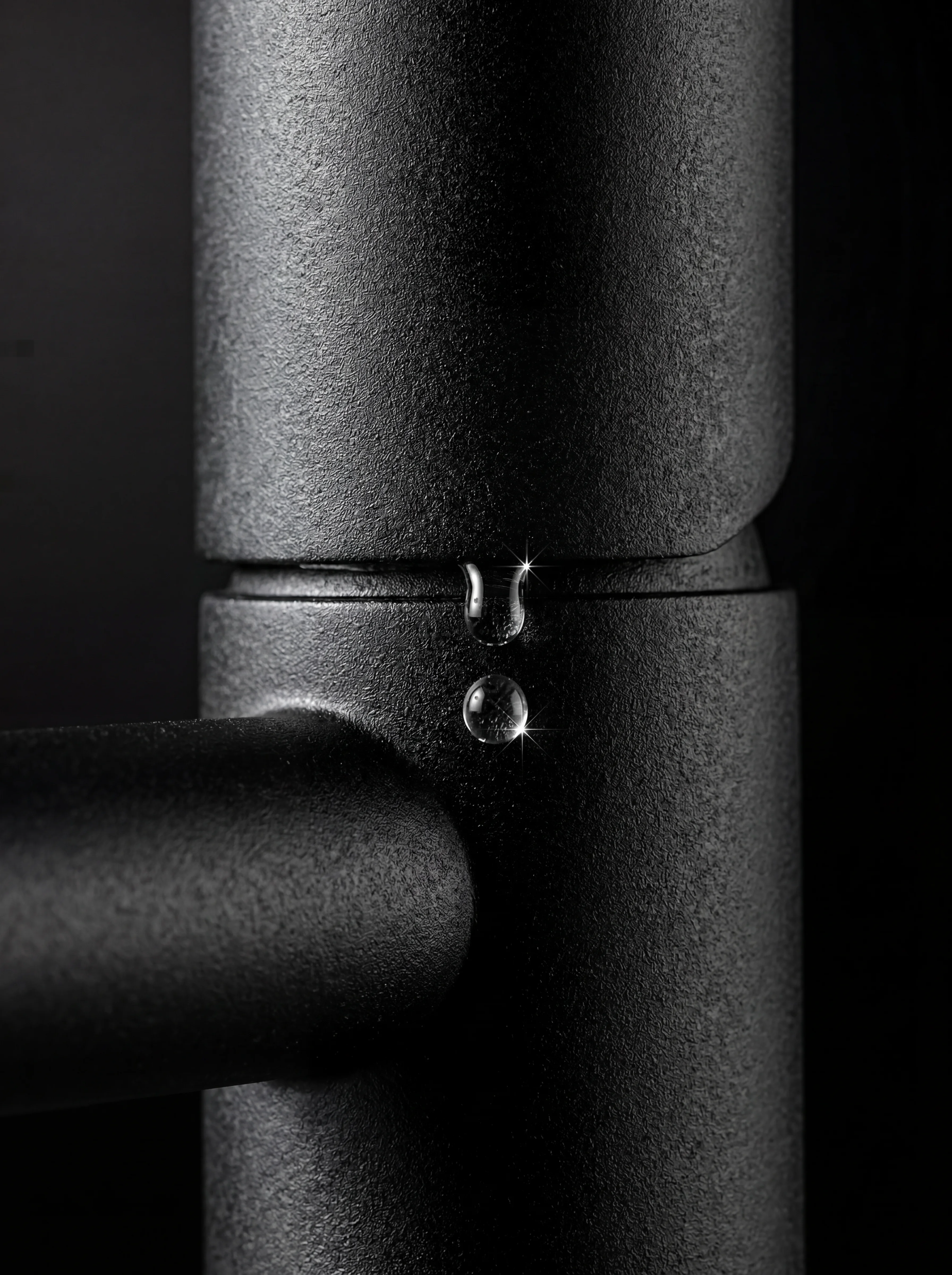 Sable basin tap detail — close-up of the matte black lever
