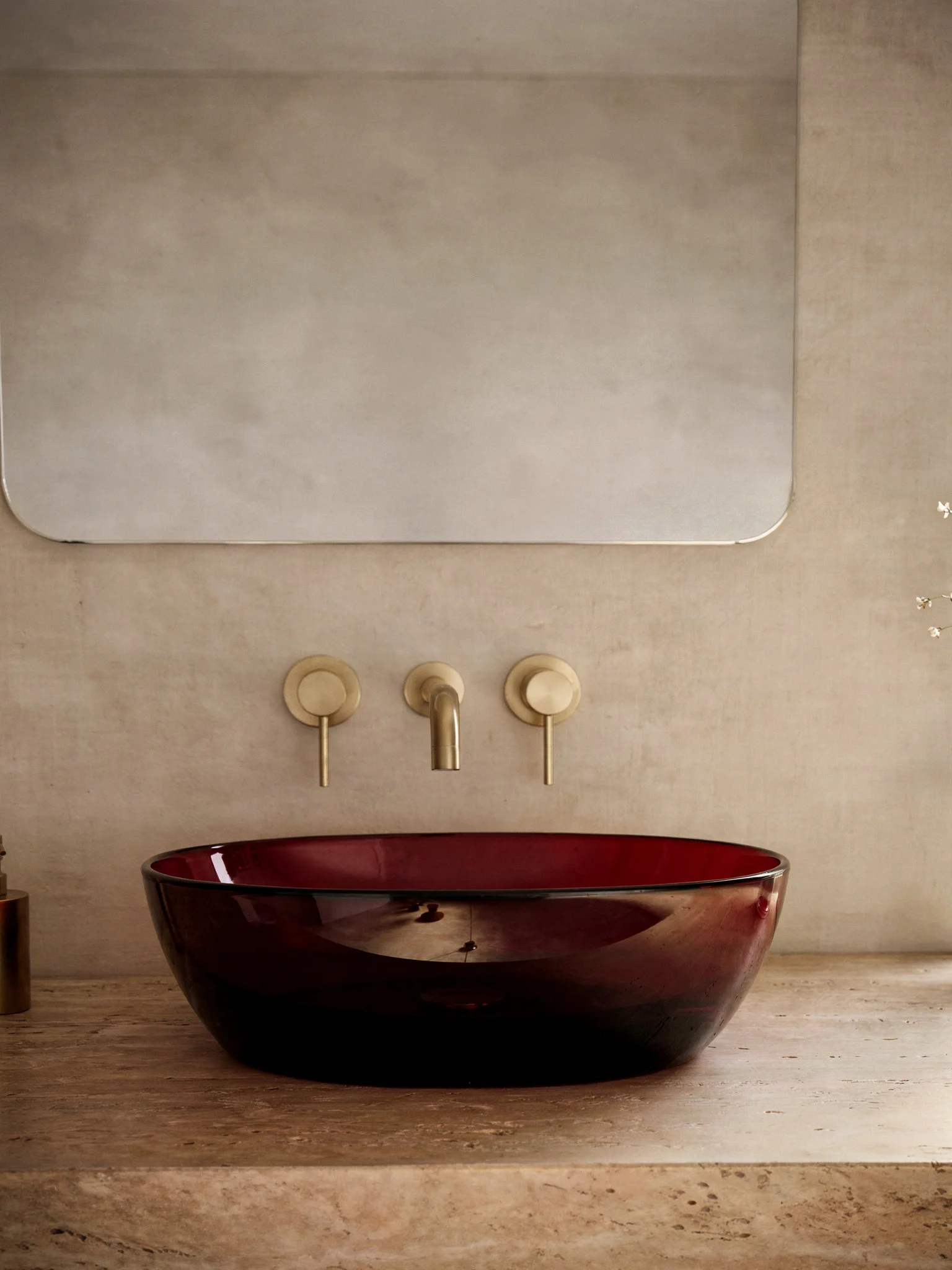 Ember basin — sculptural counter-top basin in deep red translucent resin