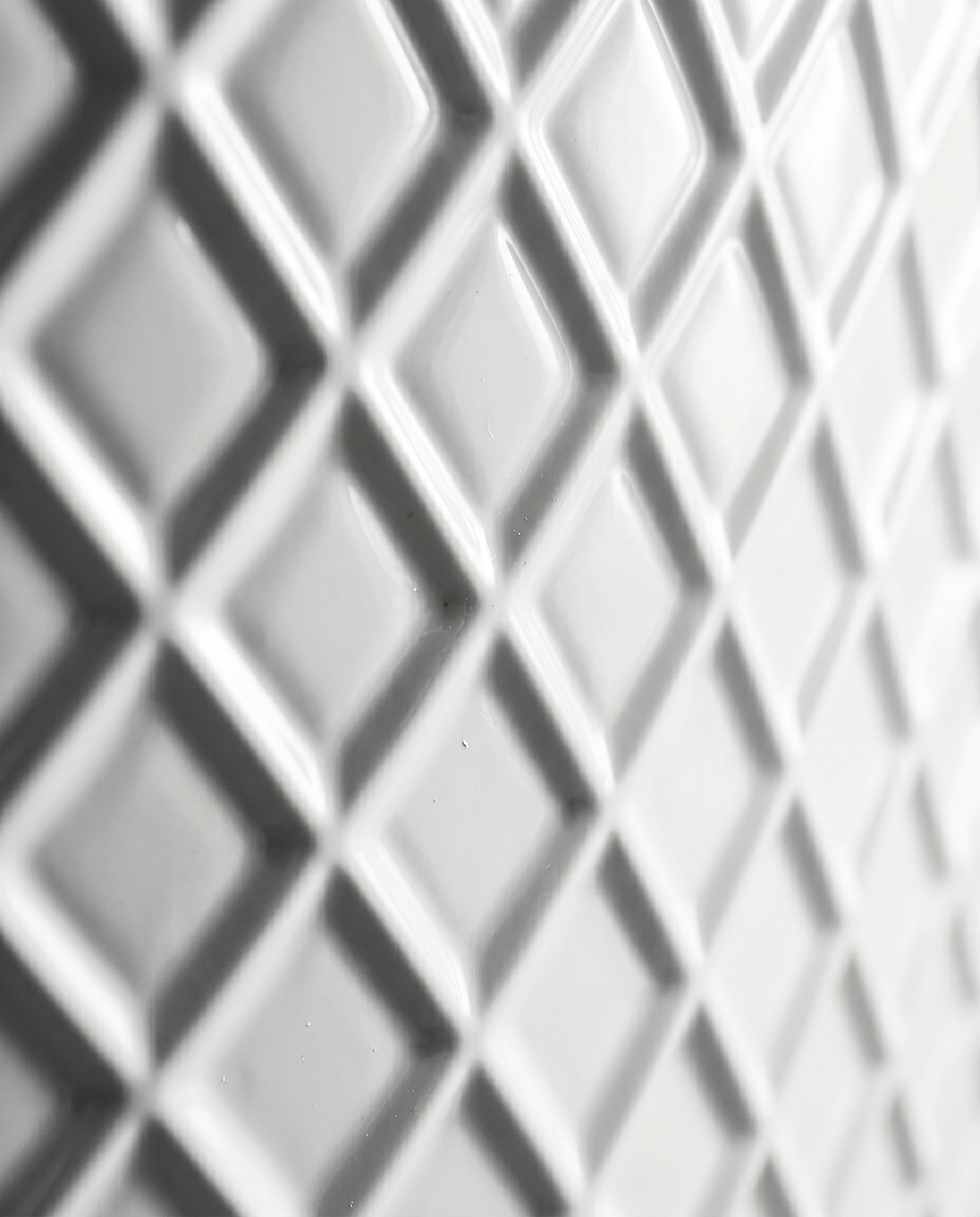 Facet bath detail — macro close-up of the diamond-textured exterior