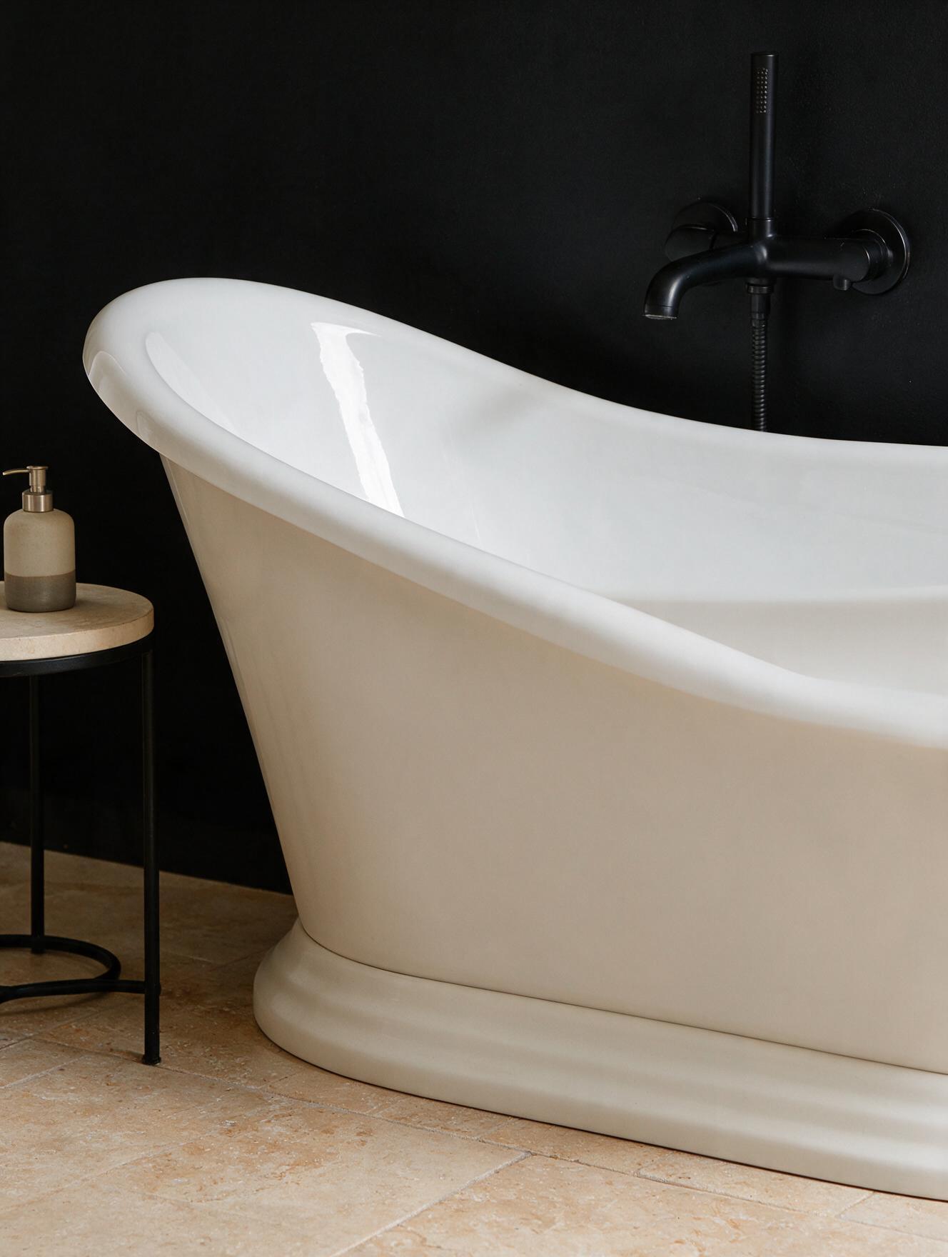 Isla bath styled with a matte black tap