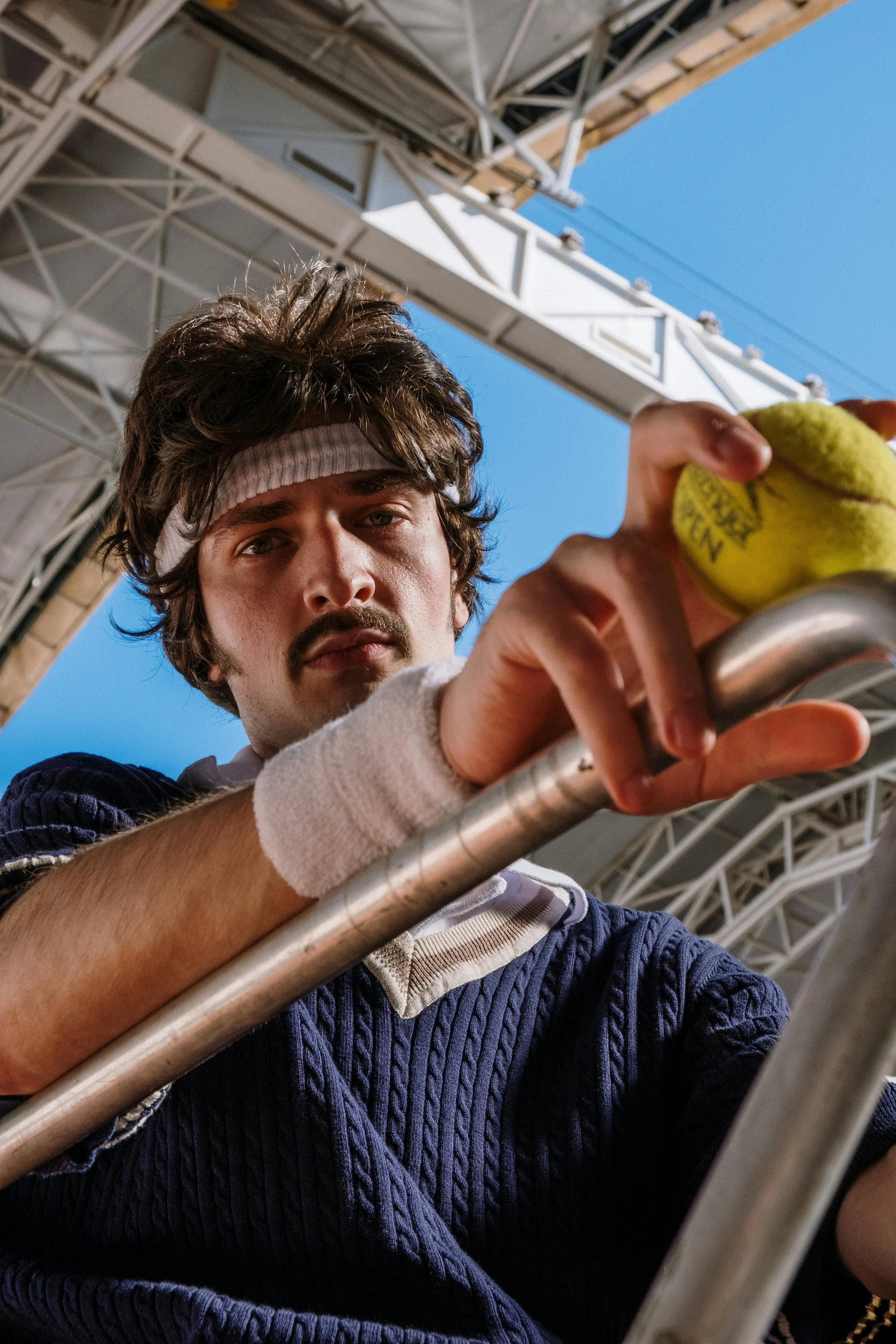 Man Sitting on the Referee Stand with Close up View