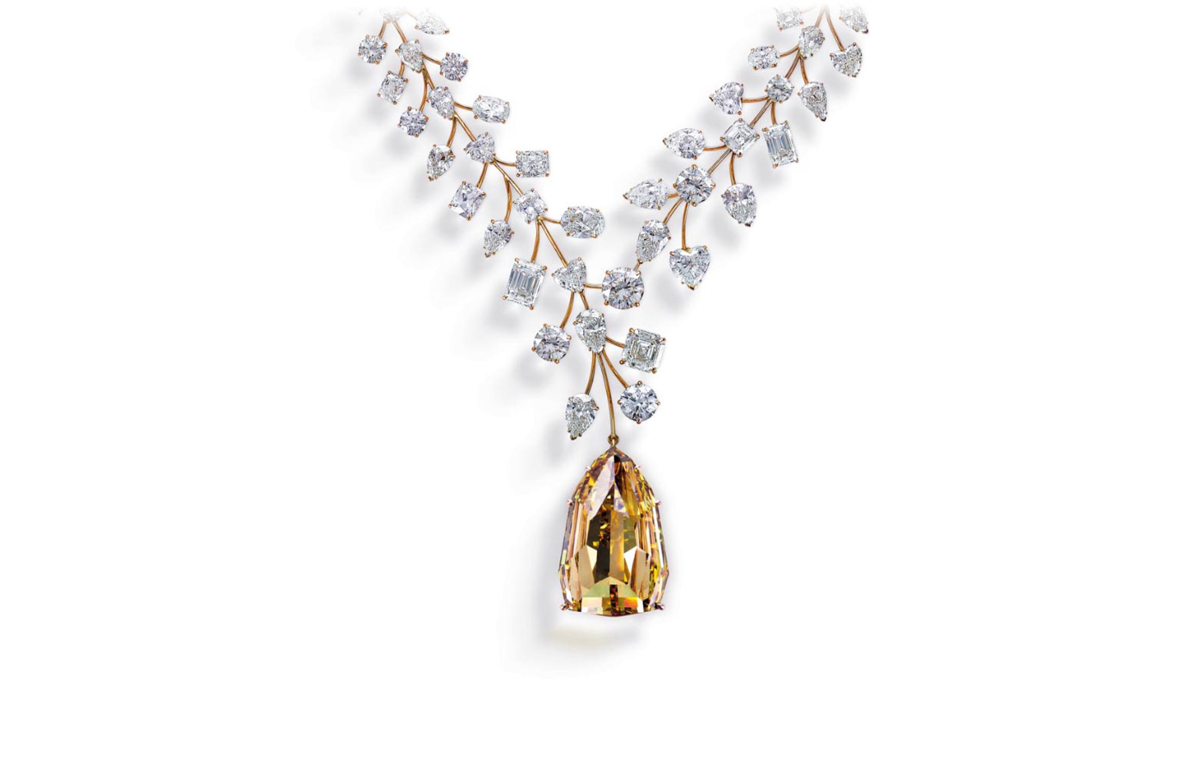 Incomparable Necklace 407 carat yellow diamond luxury jewelry with multiple white diamonds close-up