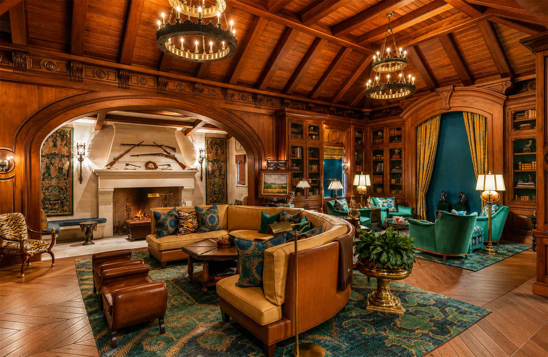 Luxury library lounge at The Oaks Estate featuring handcrafted wood paneling, vaulted timber ceilings, elegant fireplace, custom bookshelves, and refined designer furnishings.