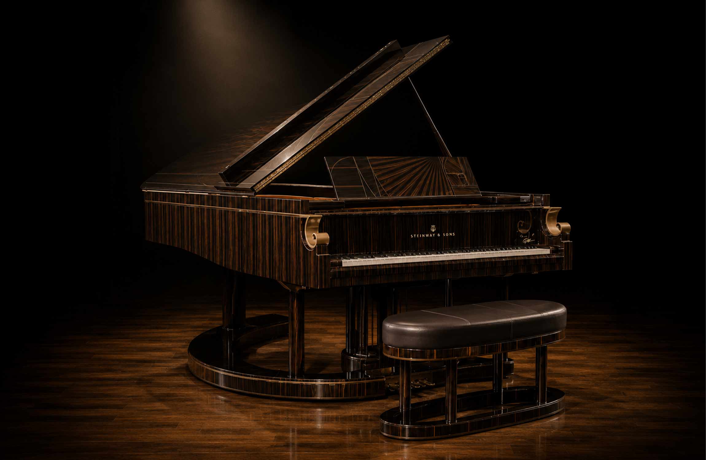 Steinway Fibonacci grand piano displayed under dramatic stage lighting with elegant Macassar ebony design