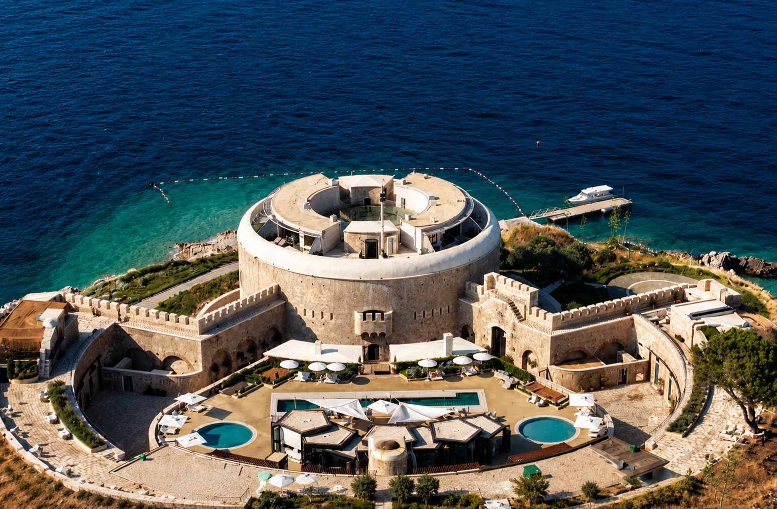 Aerial view of Mamula Island by Banyan Tree, a restored 19th-century fortress transformed into a luxury hotel on Montenegro’s Adriatic coast.