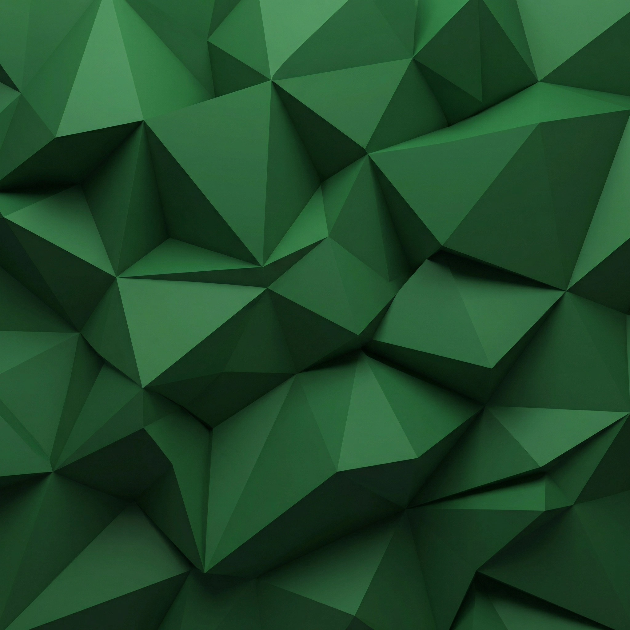 alt="Fondo geométrico verde oliva de textura low poly — HOMBRE® Caliber"