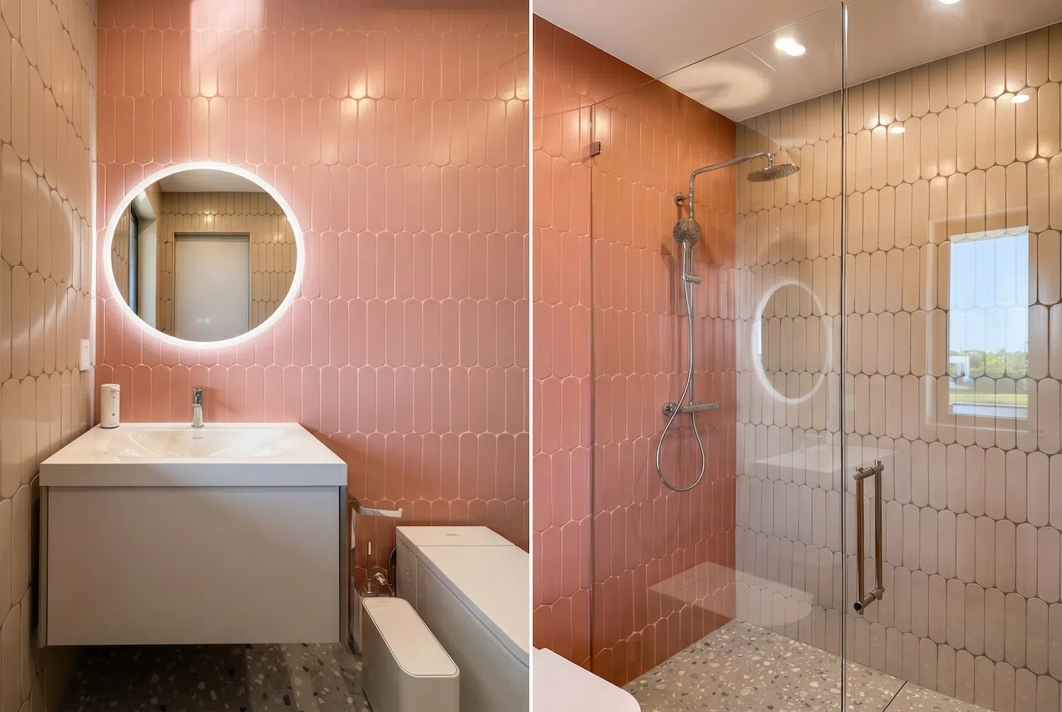 Modern pink bathroom with glossy vertical tile installation, frameless glass shower enclosure, terrazzo flooring, and illuminated round mirror in a custom Miami bathroom renovation.