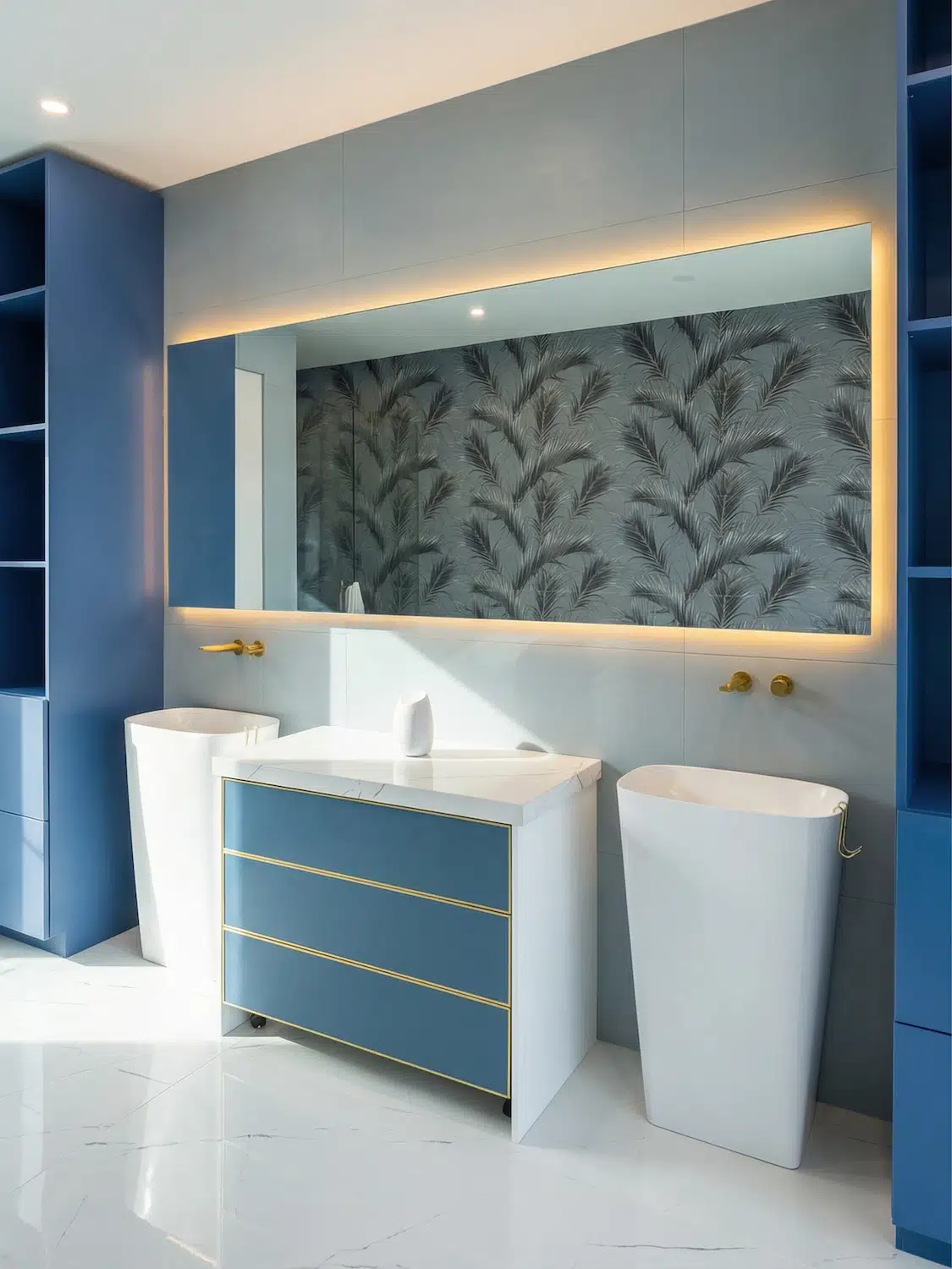 Custom blue bathroom vanity with integrated LED mirror, gold fixtures, and luxury porcelain tile installed by ArtivaTile in Miami.