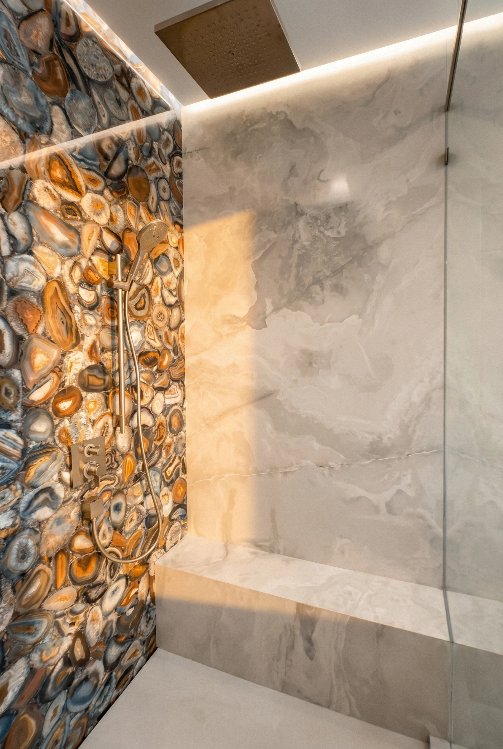 High-end bathroom with seamless wall tile installation and architectural lighting