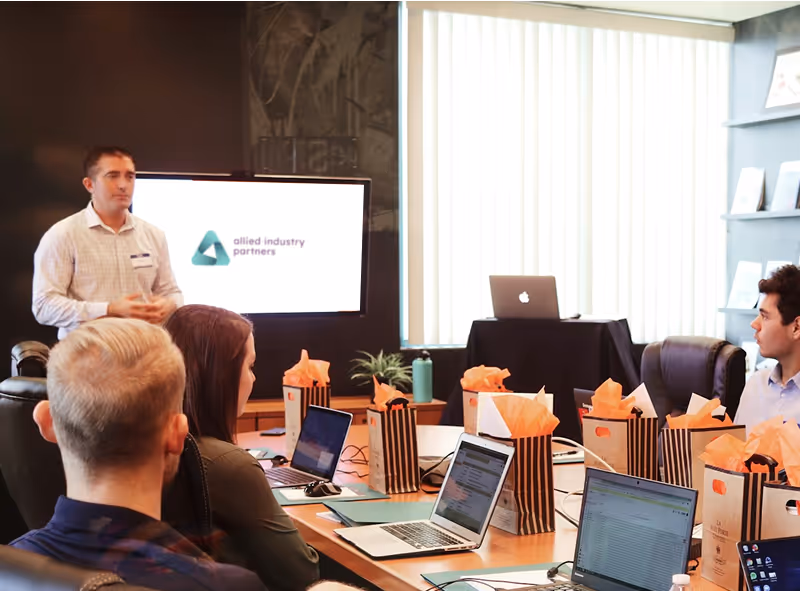 Talk by AIP with AIP logo on whiteboard