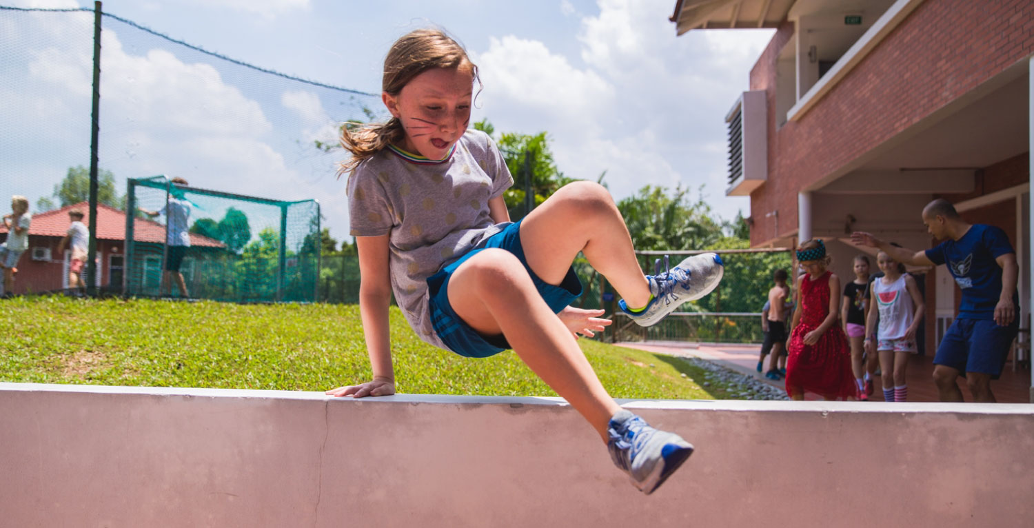 international primary school kids playing