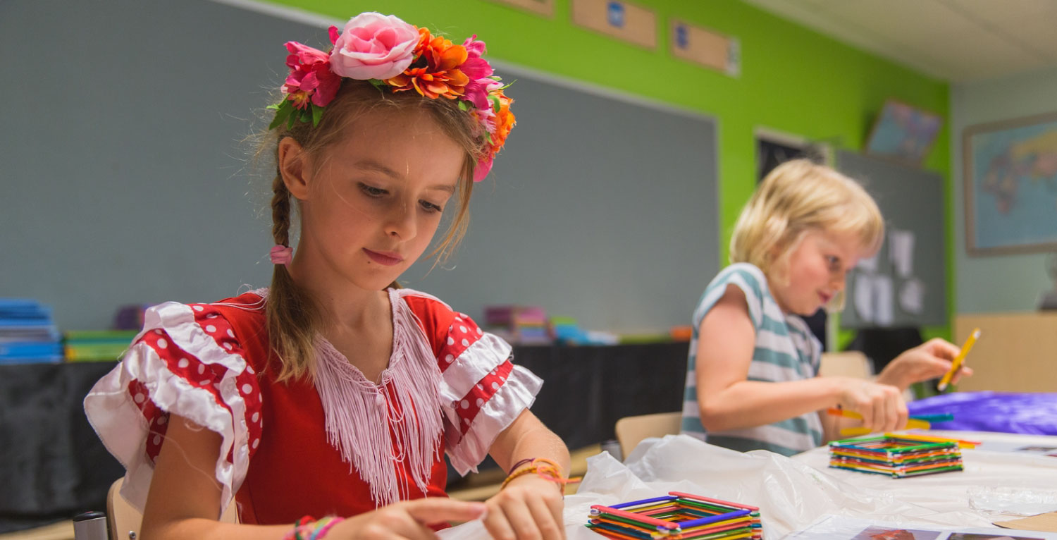 international primary school kids playing