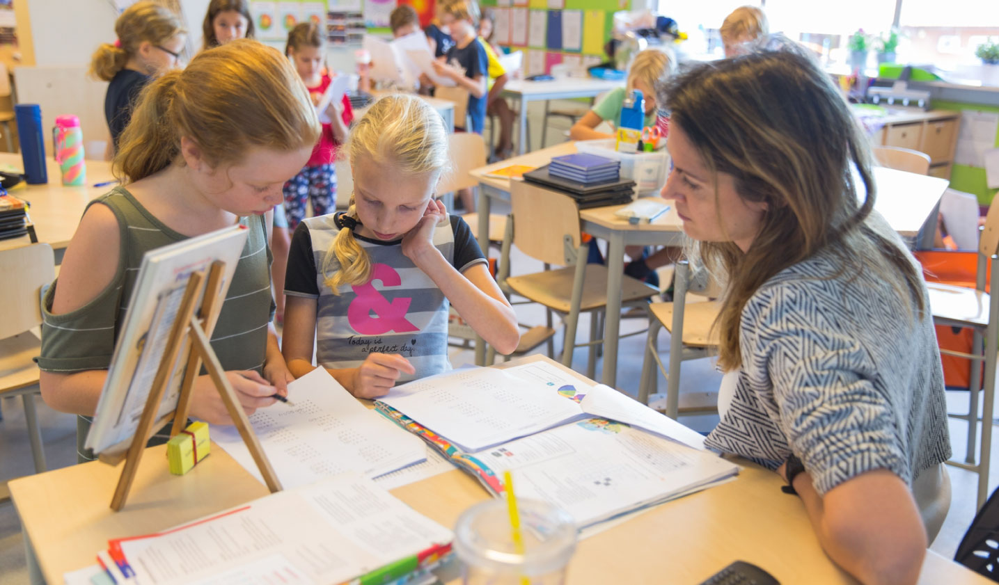 international primary school kids playing