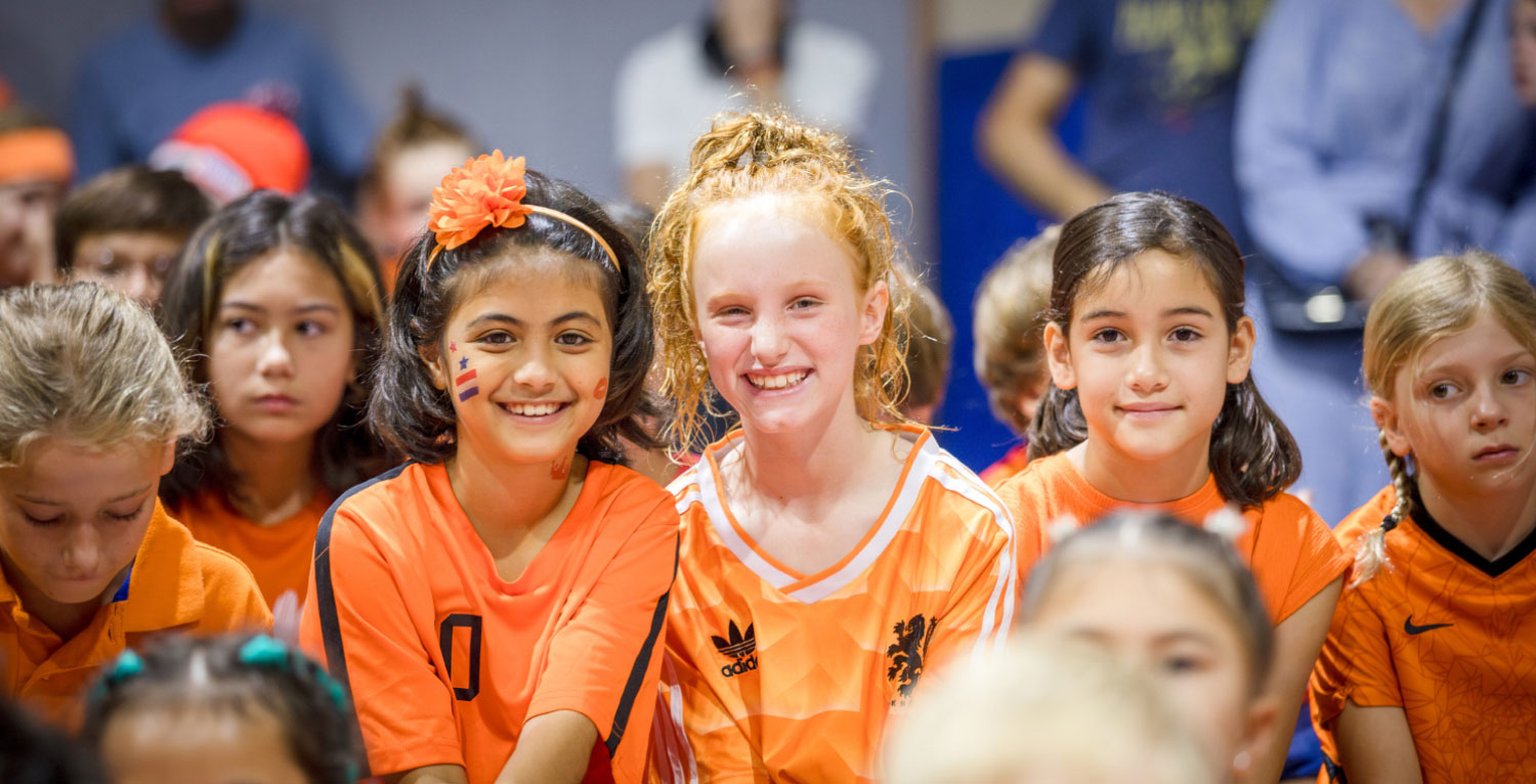 international primary school kids playing