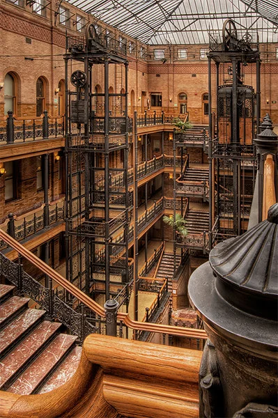 The Bradbury Building | One of a Kind Filigree Elevator and Central Atrium  — Elevator Scene | Cab Interior Design, Modernizations & More