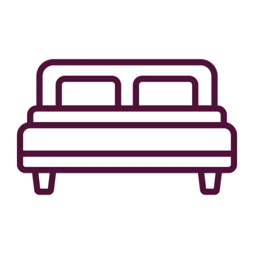 Ikona postele so základným rámom a dvoma vankúšmi.