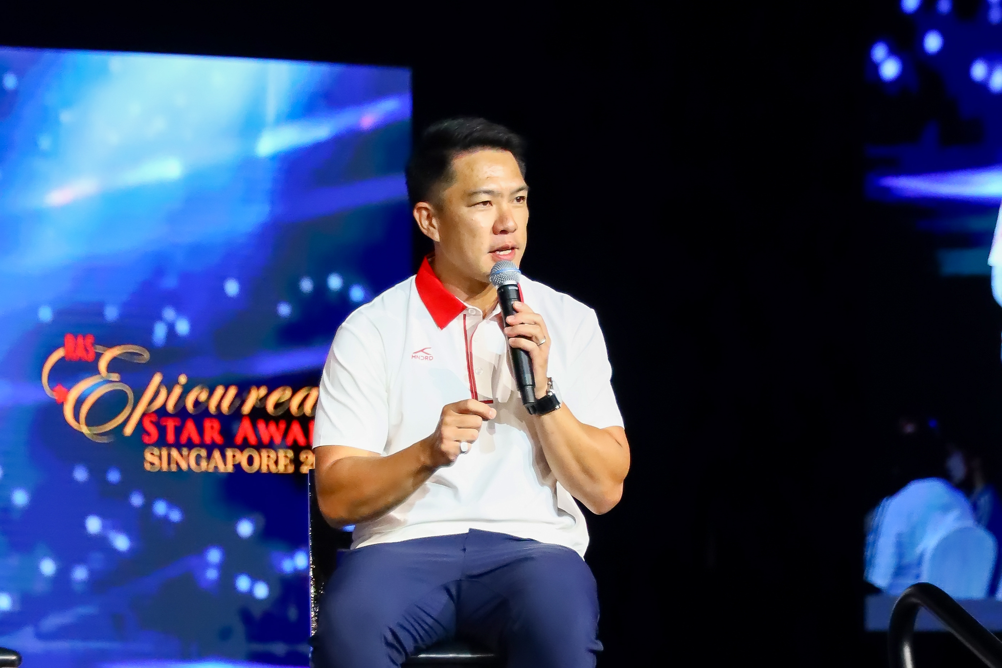 A speaker on the Epicurean Star Award stage