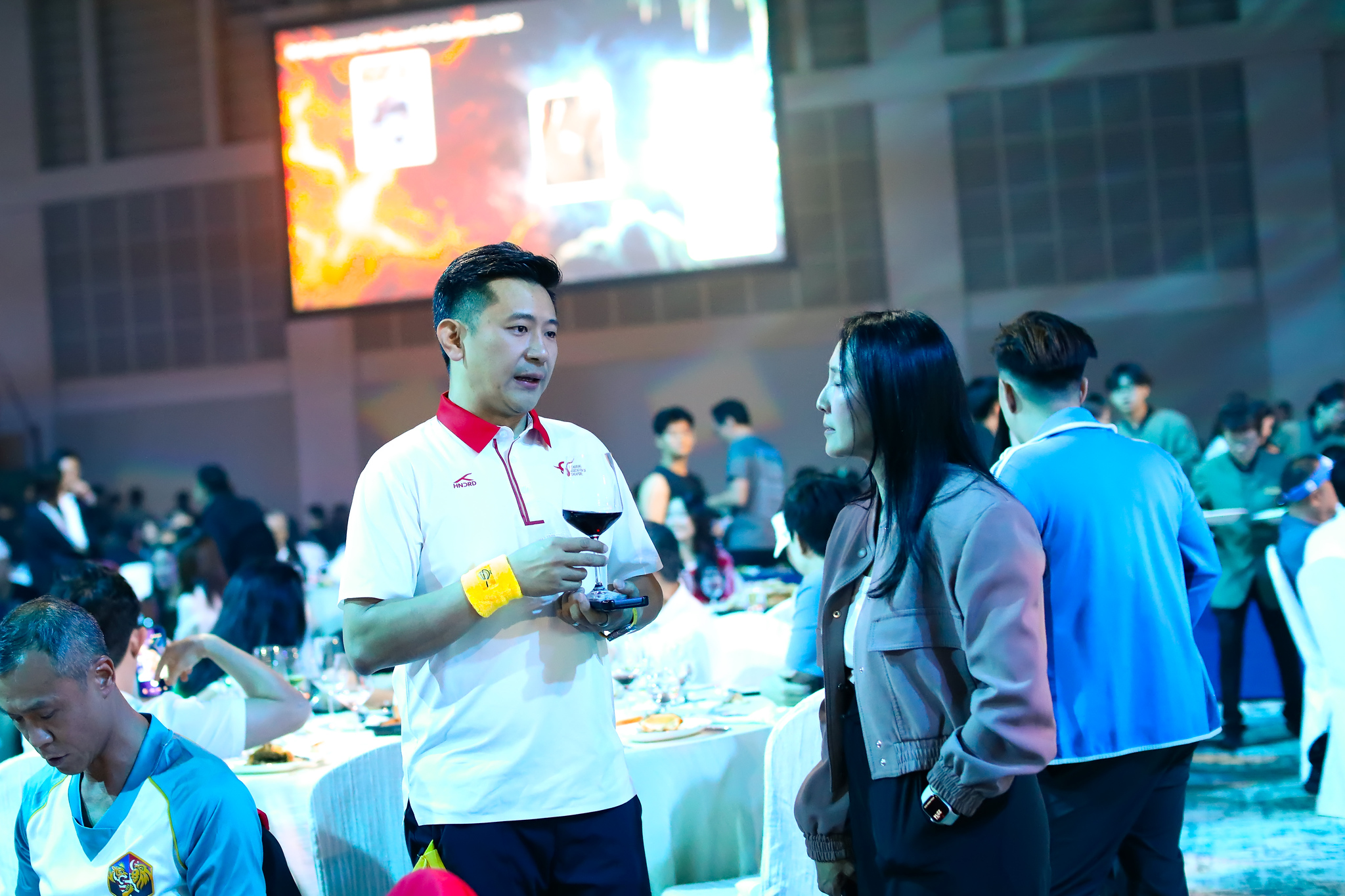 Mingling across the ballroom
