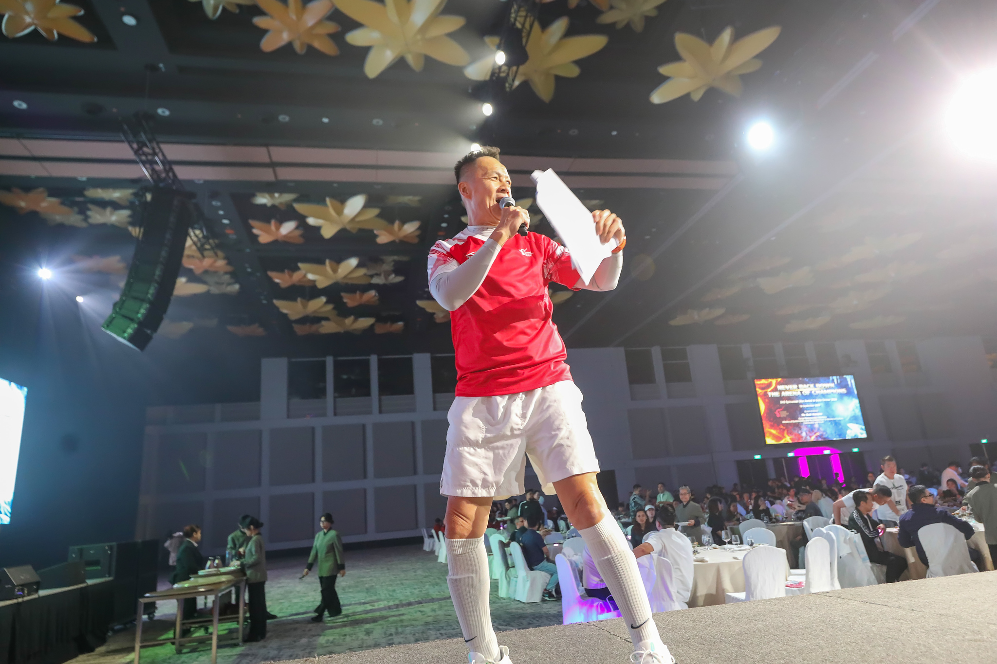 A performer entertains the ballroom