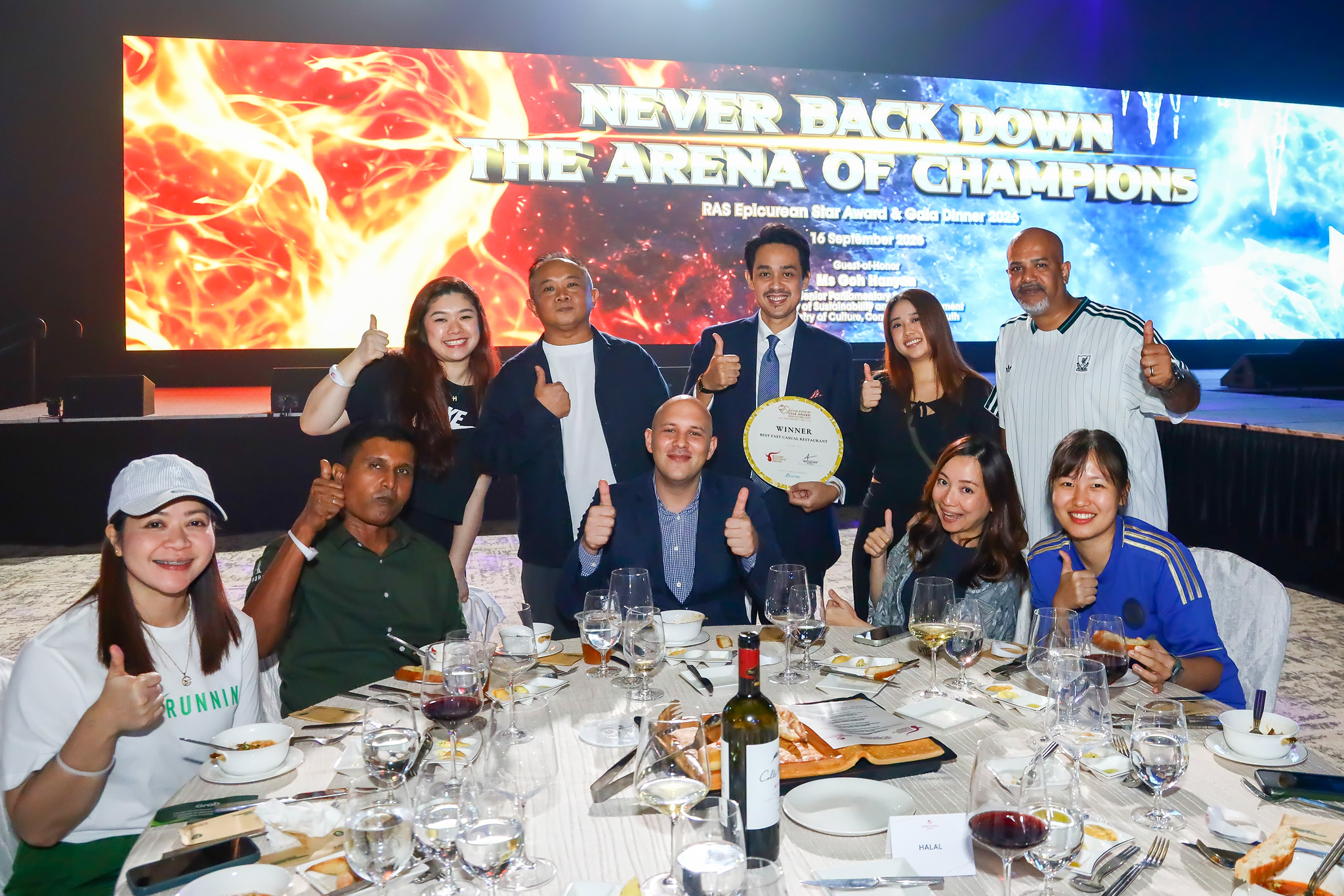 Winners and guests celebrate at their table