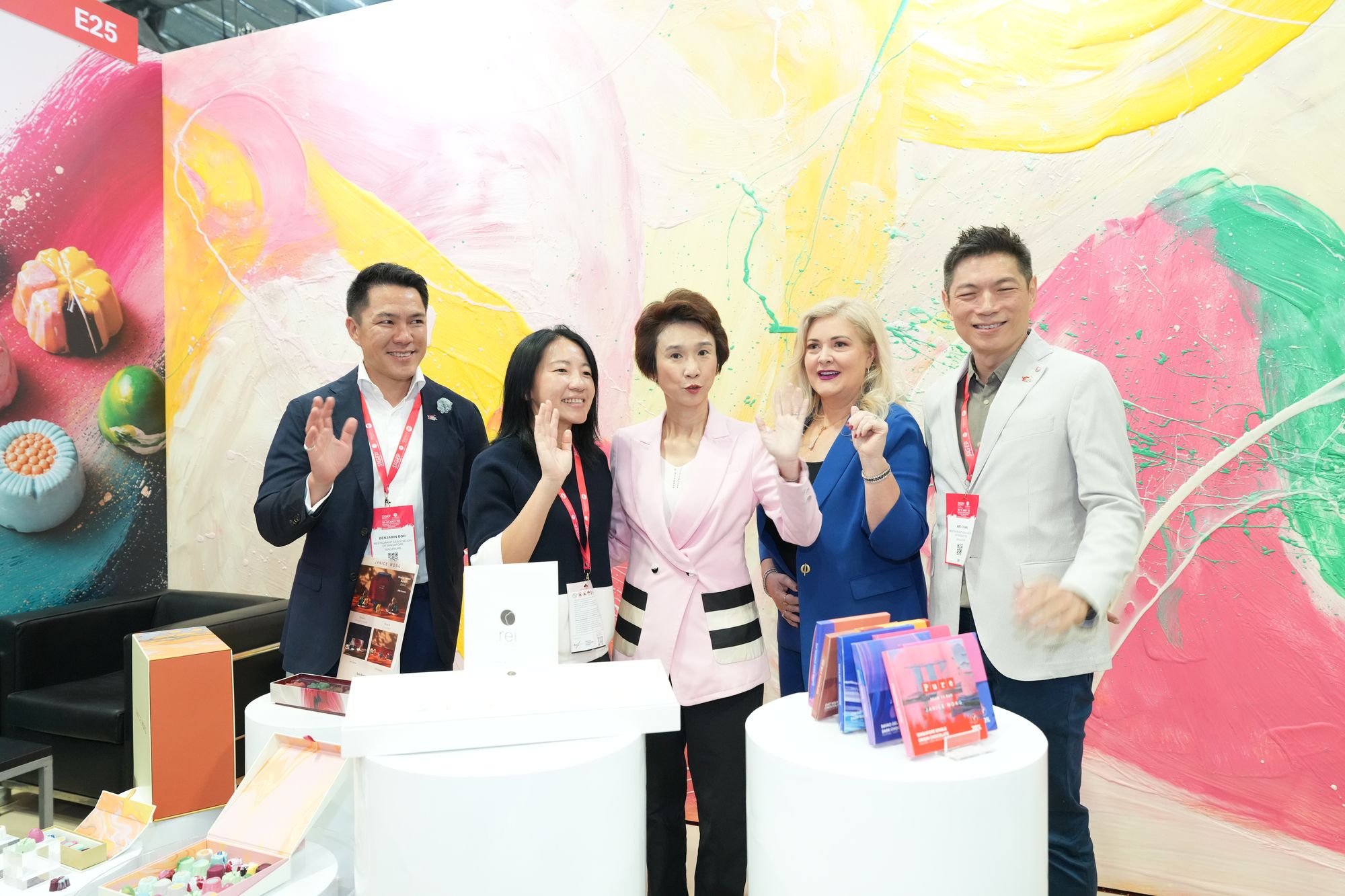 Visitors exploring an exhibitor showcase