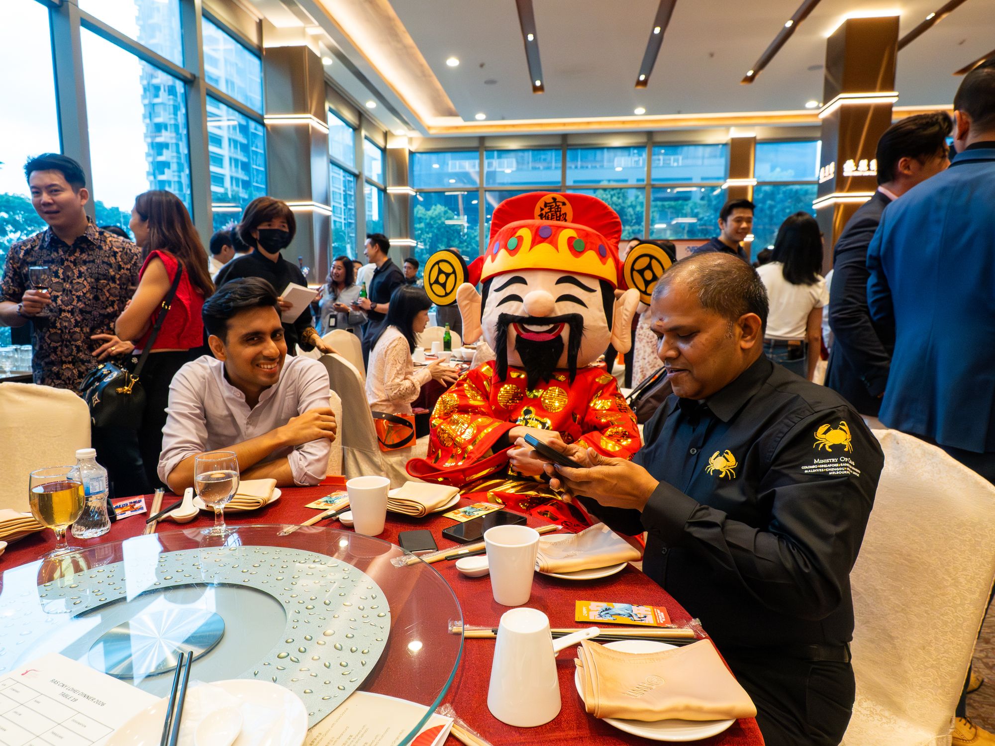 The God of Fortune visits a dinner table