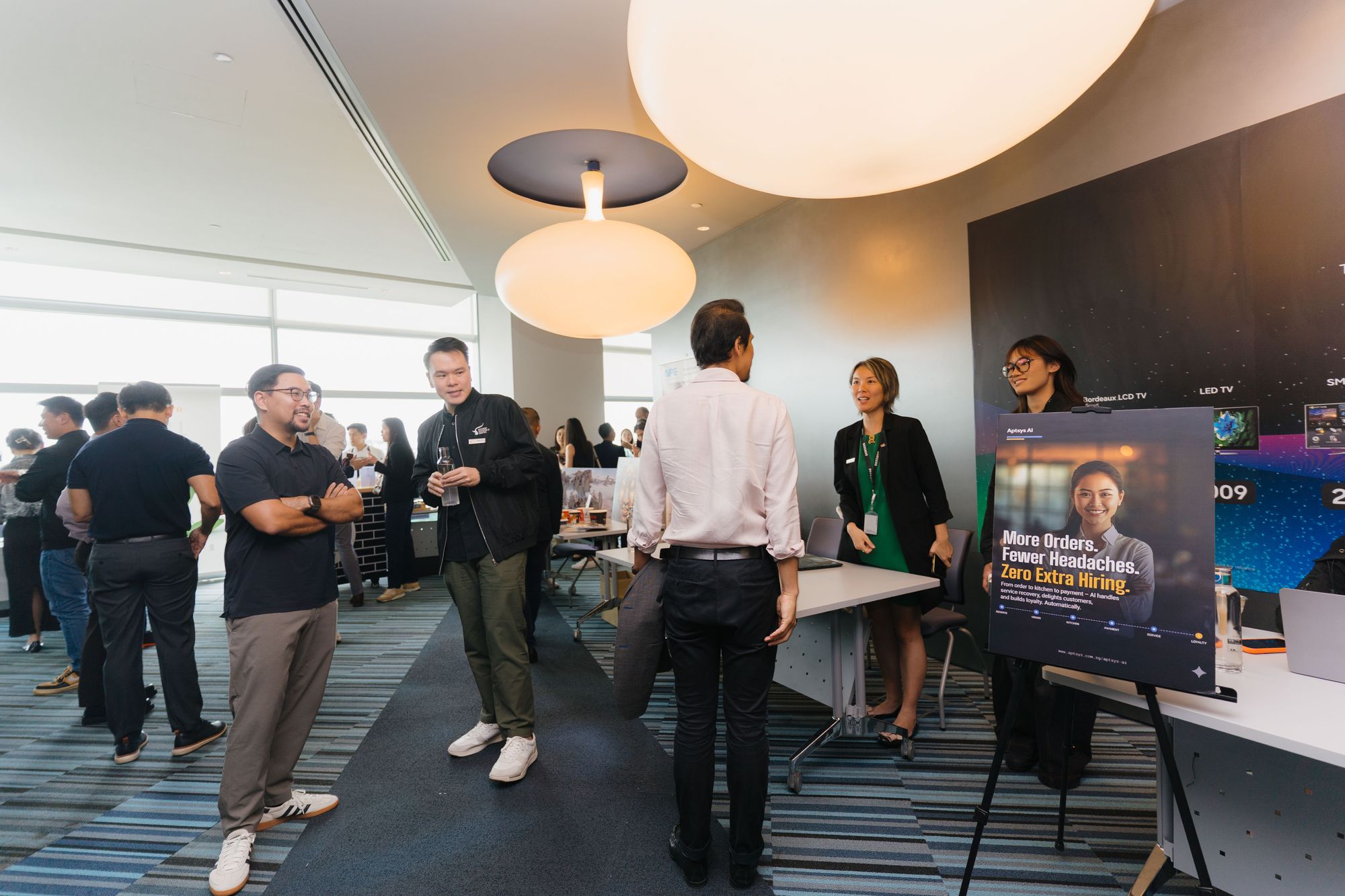 Members mingle at Samsung's regional headquarters before the meeting