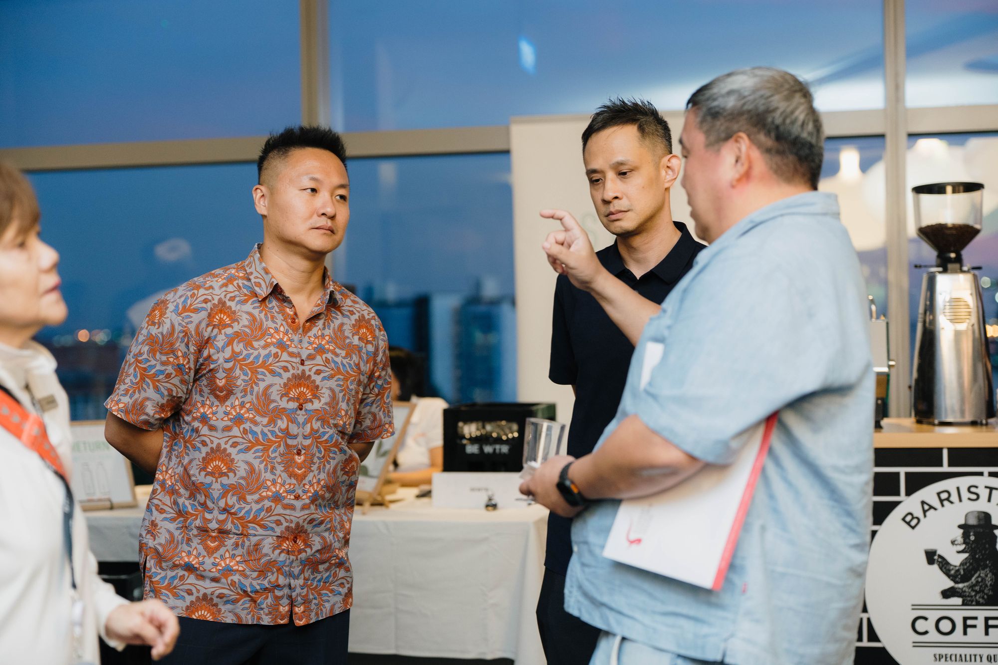 Members network over coffee after the meeting