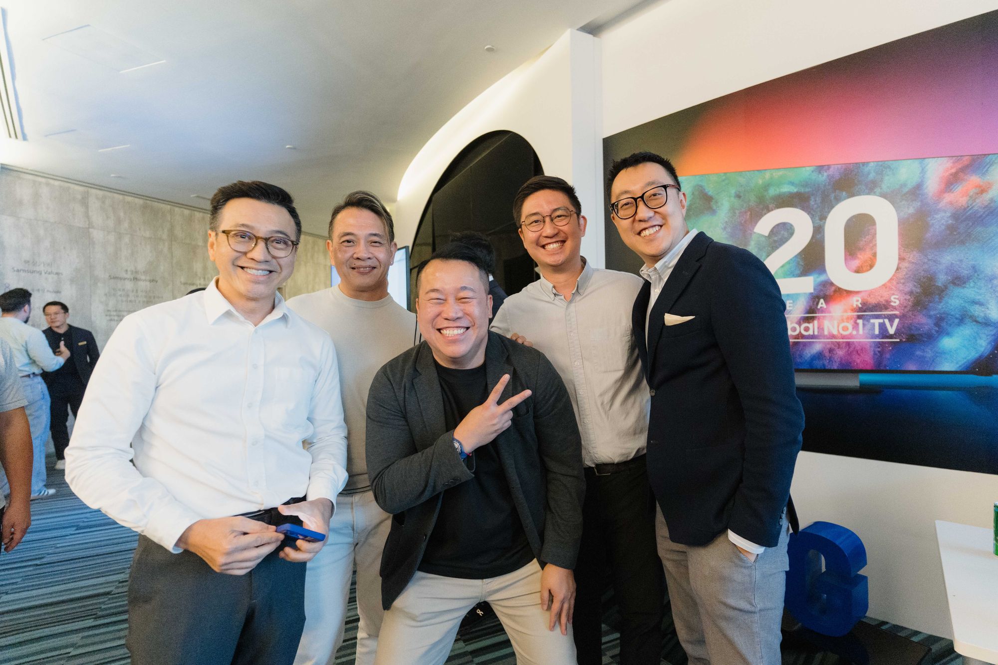 Members pose for a photo after the meeting