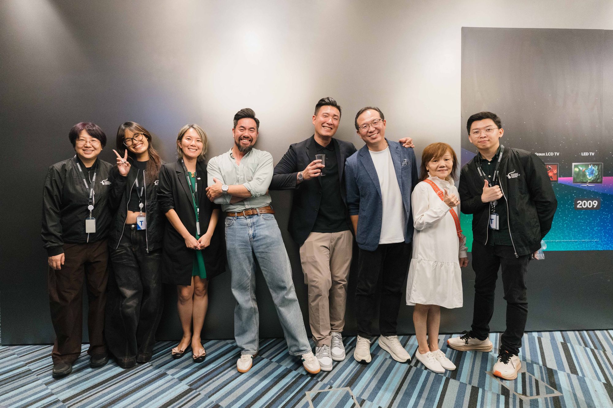 Guests line up for a group photo