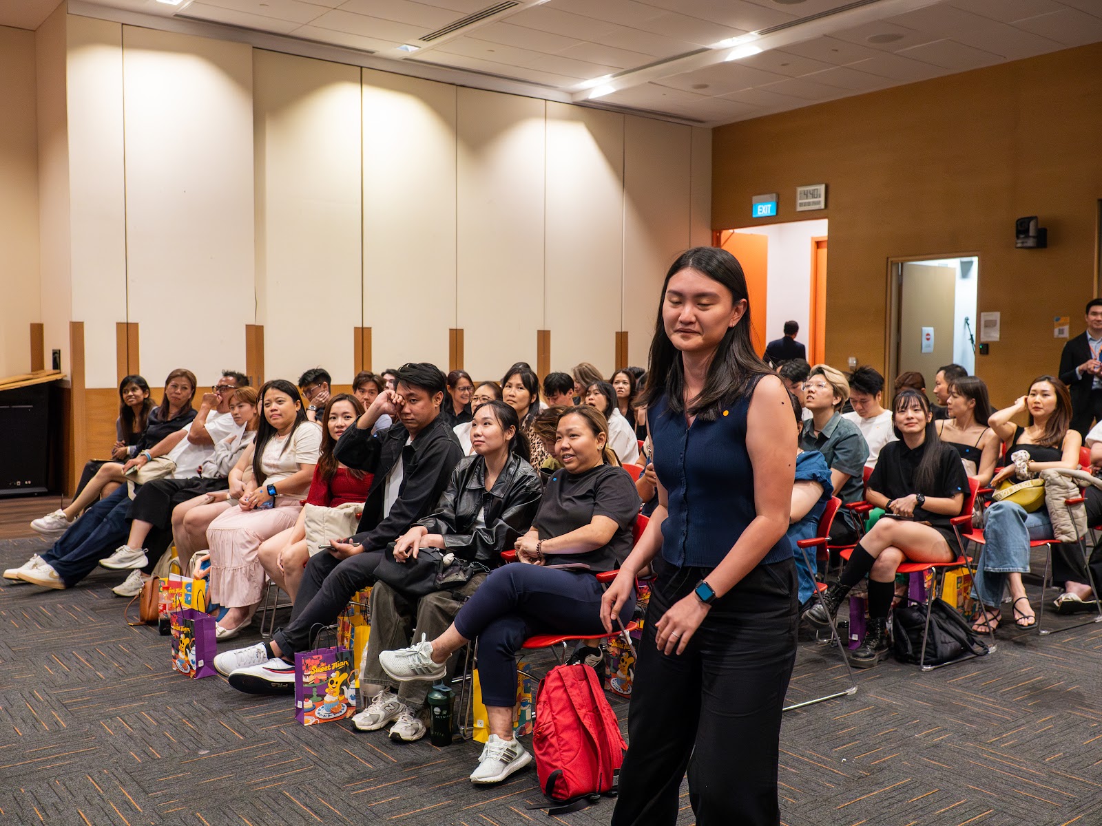 A speaker addressing a full hall of F&B operators