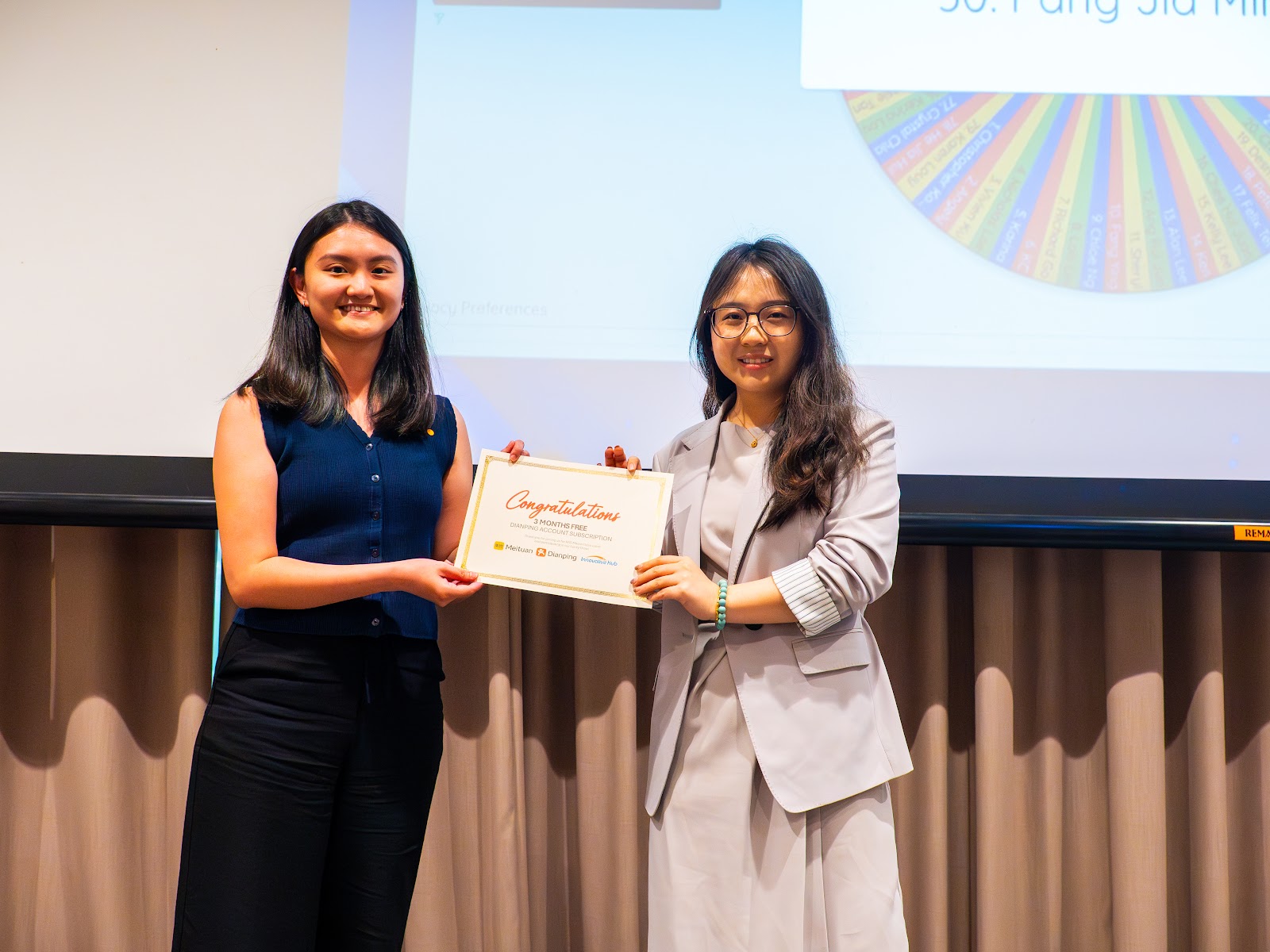 A speaker receiving a certificate of appreciation