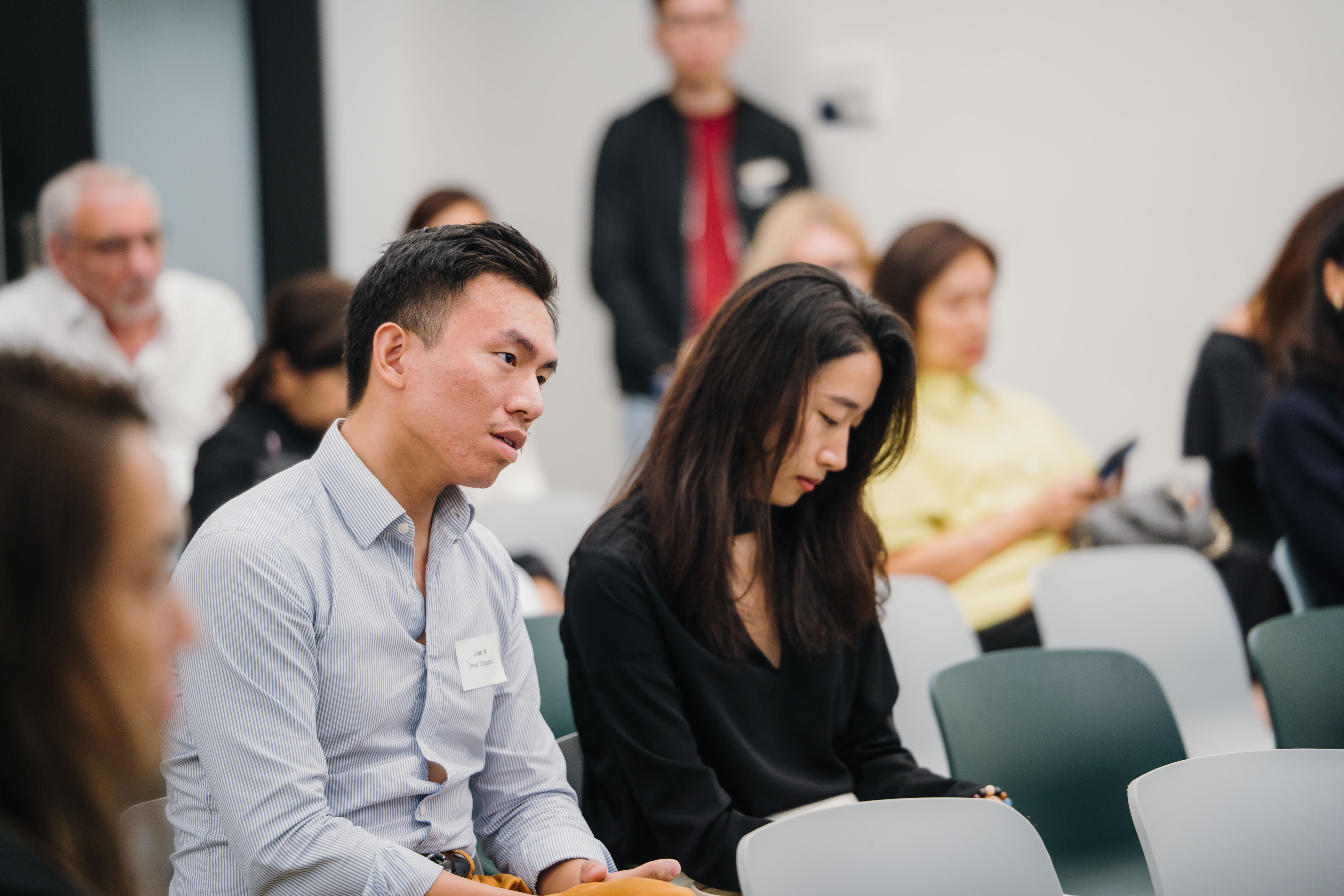 Members listen during the meeting