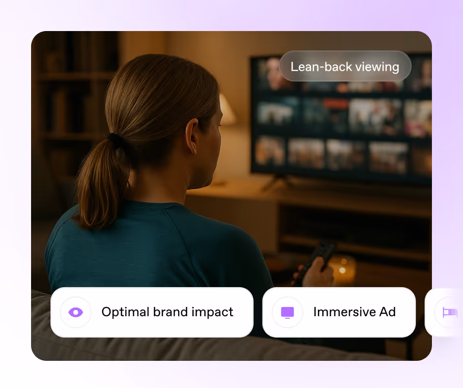 Woman with brown hair tied in a ponytail sitting on a couch, holding a remote and watching a TV screen with multiple blurred thumbnails, labeled 'Lean-back viewing.' On-screen icons read 'Optimal brand impact' and 'Immersive Ad'.