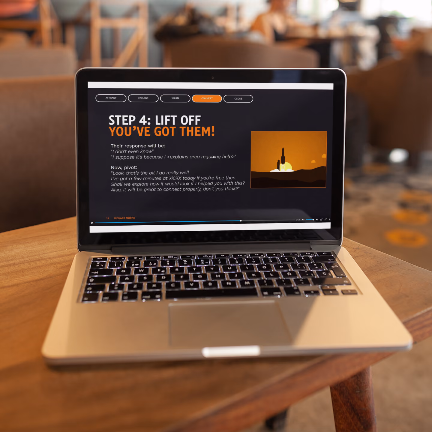 Laptop on wooden table showing Step 4: Lift off, you've got them, with rocket launch graphic.