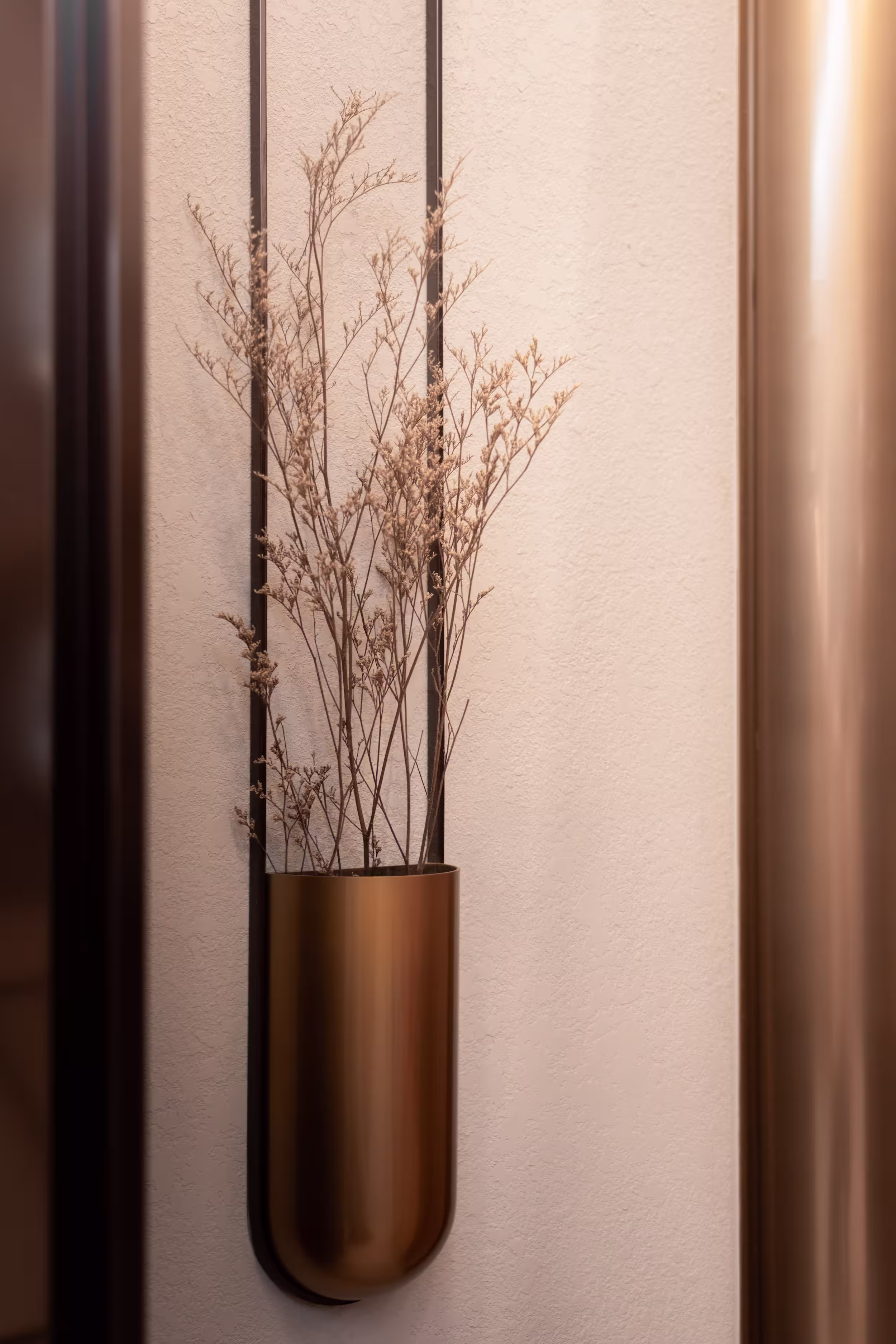 Tea Chateau rear store view with library wall, tea bar stools, and circular hero display visible at the shopfront