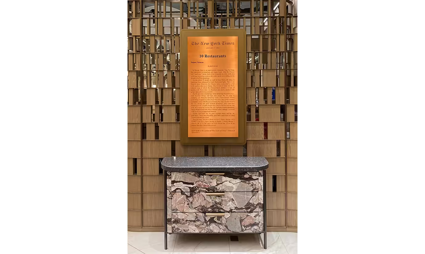 Din Tai Fung Studio City Macau restaurant dining area with bespoke interior design and atmospheric lighting