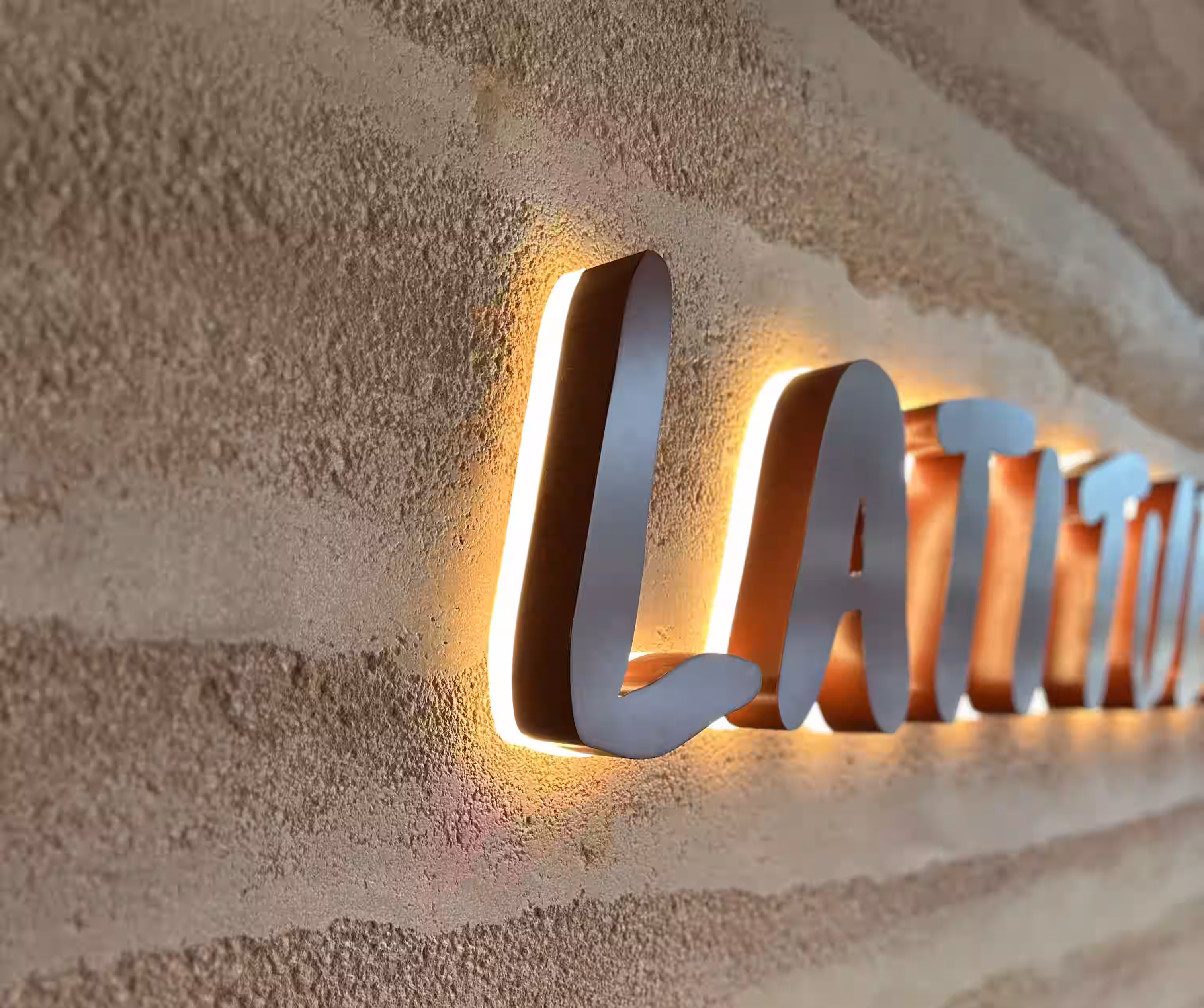 Latitude Bistro interior detail at ONE°15 Marina Sentosa Cove showing dining area material palette and design elements