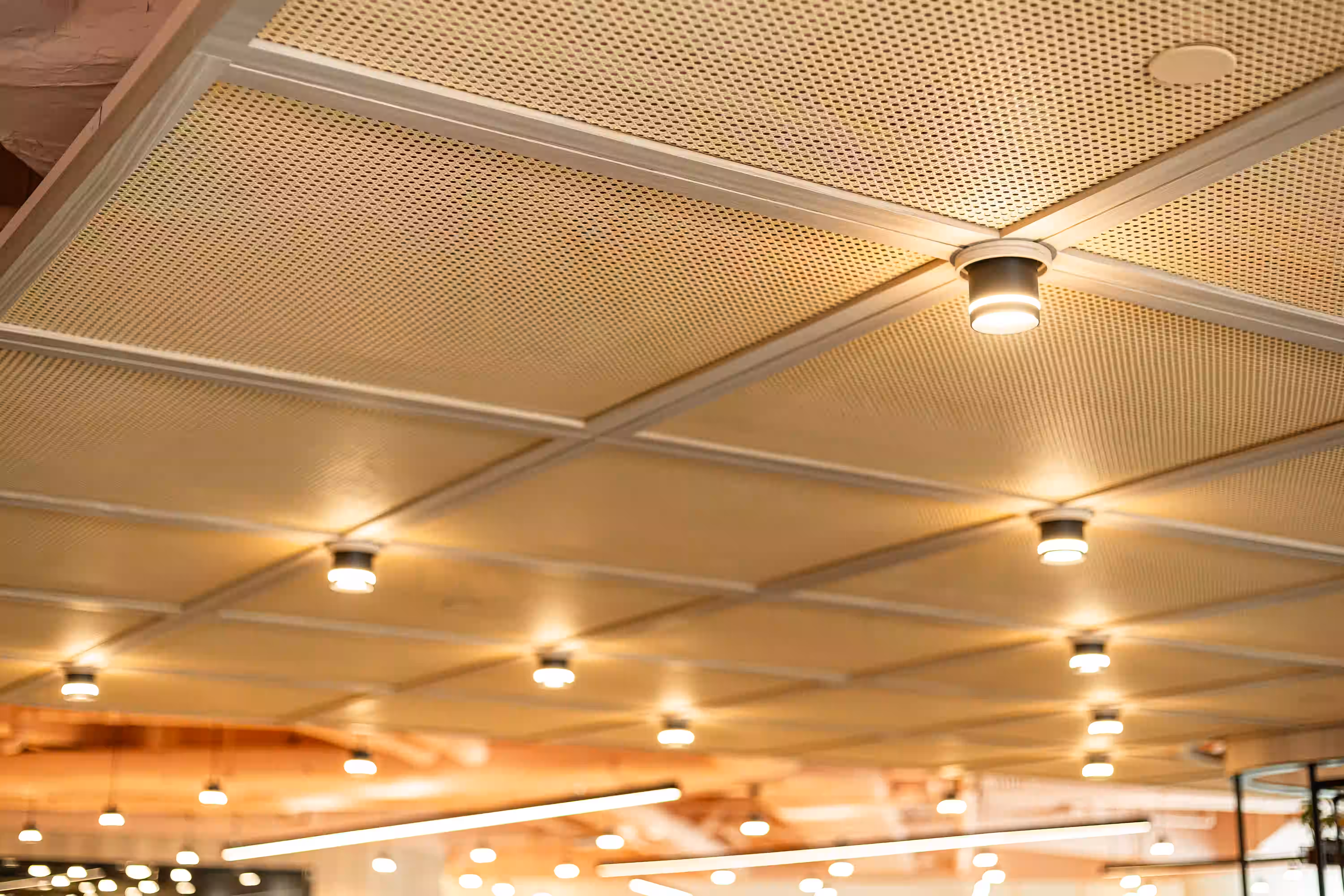 Assembly Global office perimeter workspace in Sheung Wan Hong Kong with harbour-facing desking and task lighting