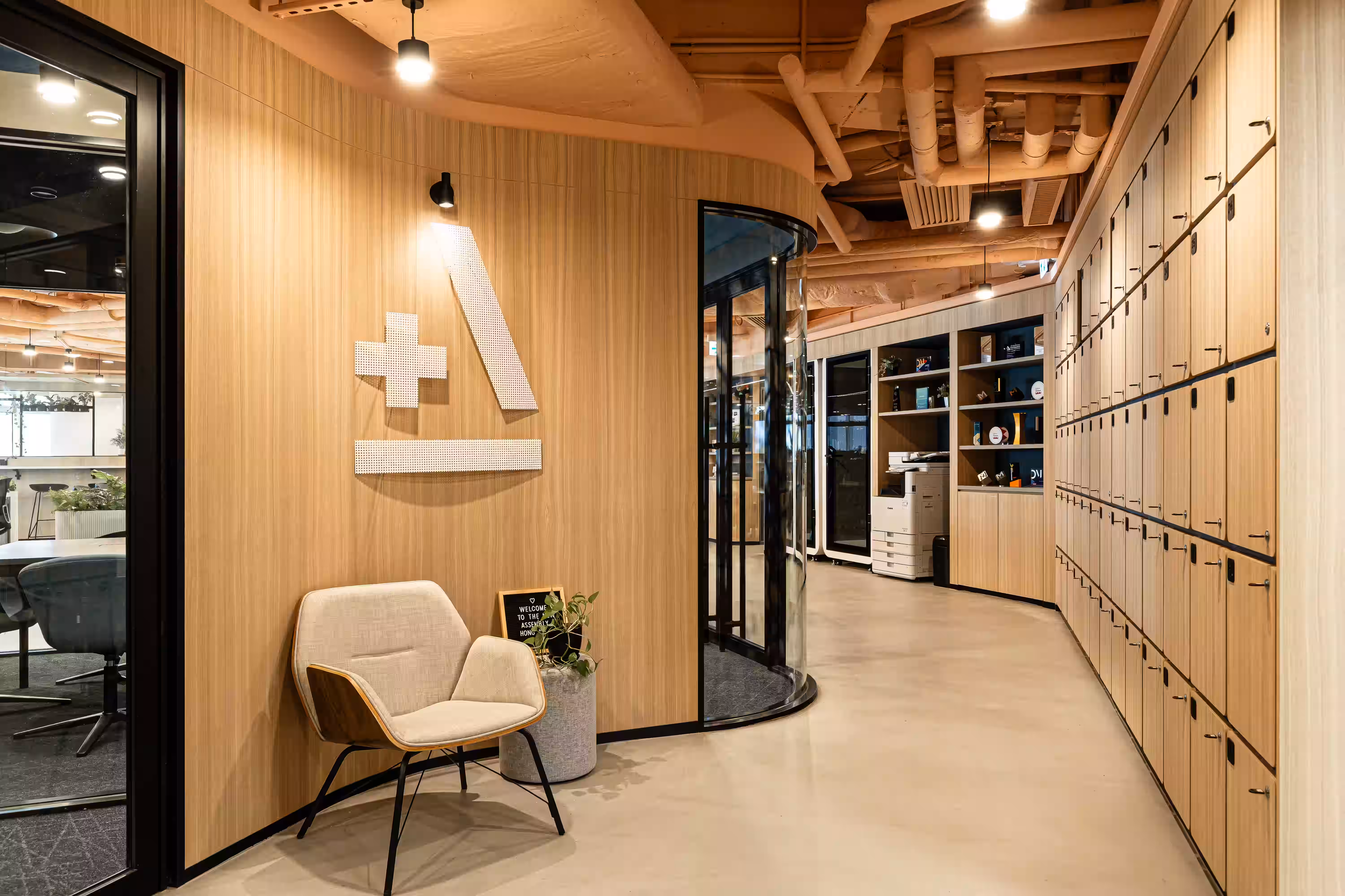 Assembly Global office detail showing material and finish elements with timber, metal, and textile design features