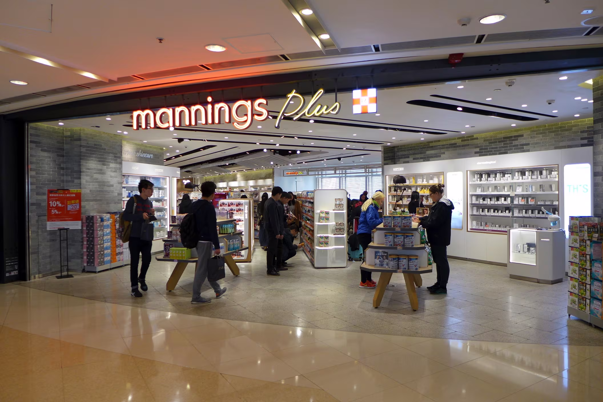 Original Mannings Plus store at IFC Mall Hong Kong in 2016 prior to Studio X redesign showing the previous retail format and layout