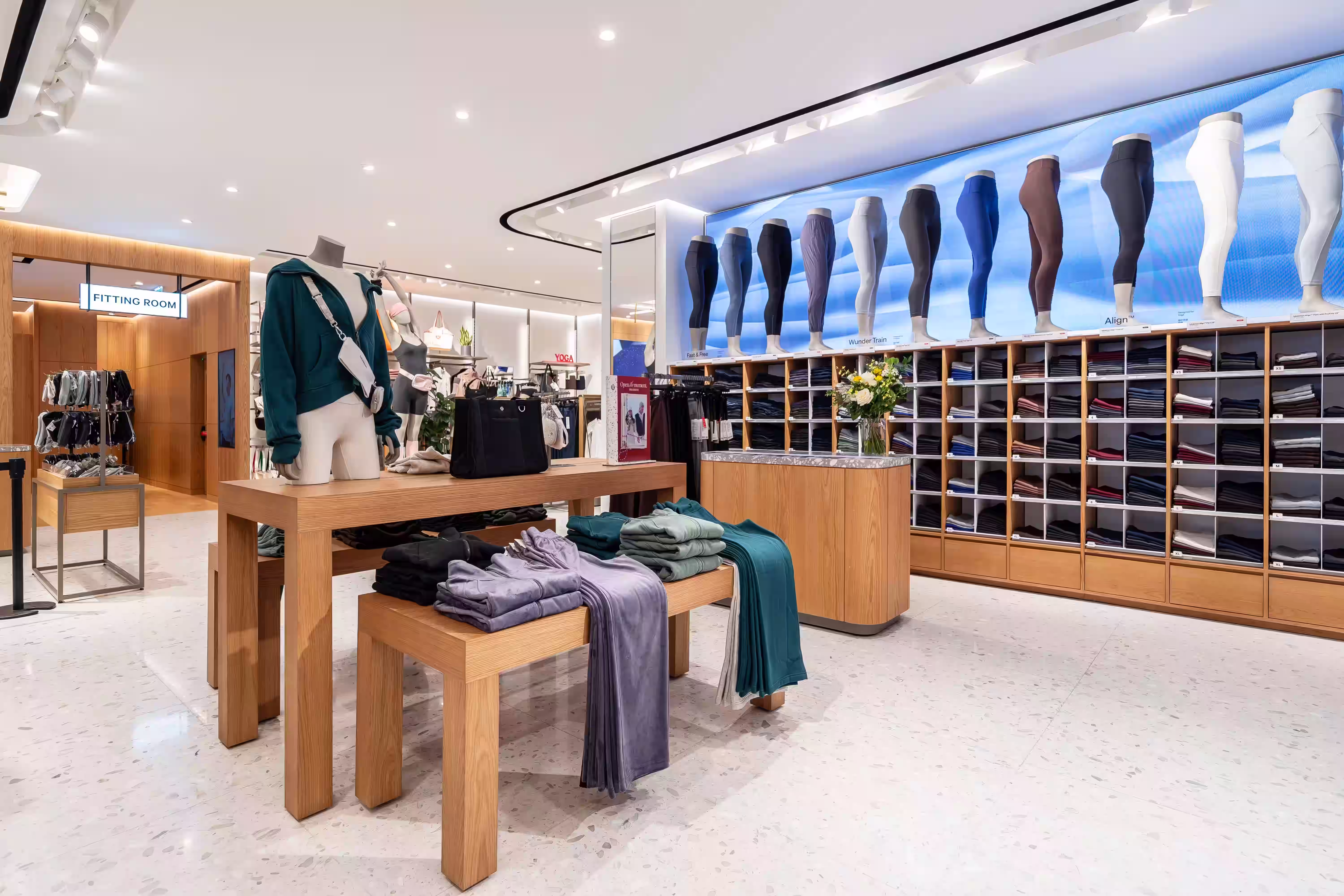 lululemon Pacific Place flagship fitting room area at Pacific Place Hong Kong with curtained change rooms and lounge seating