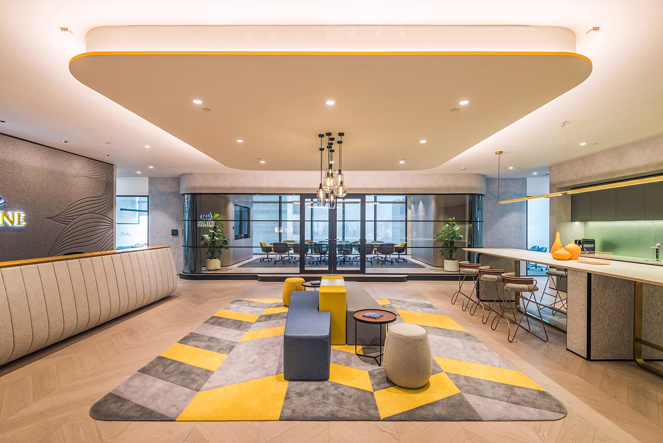 L'Occitane Asia headquarters open workspace at K11 Atelier Hong Kong showing the 27,000 sqft two-level workplace environment