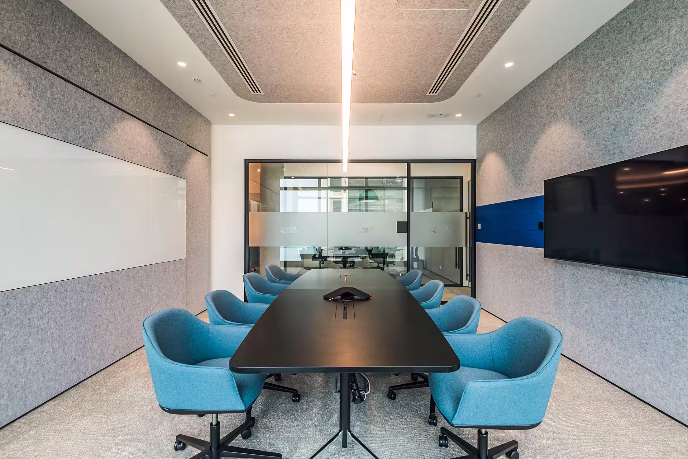 L'Occitane Asia headquarters detail showing material and finish close-up with natural textures and brand colour integration