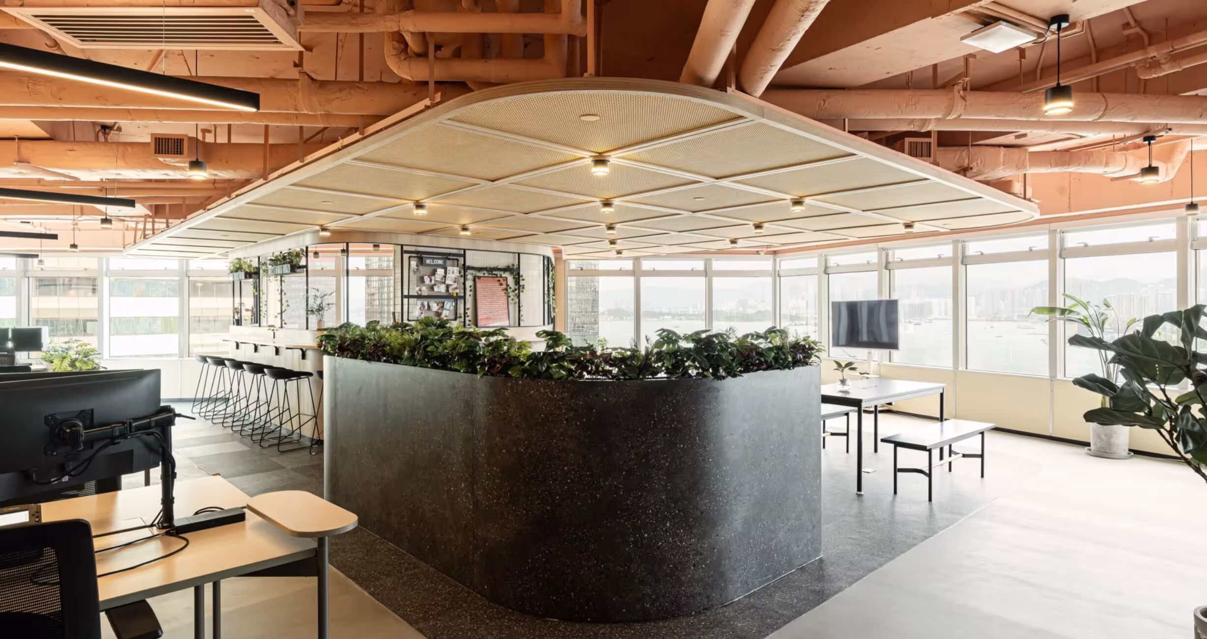 Assembly Global headquarters in Sheung Wan Hong Kong showing the redesigned open-plan workspace with harbour views