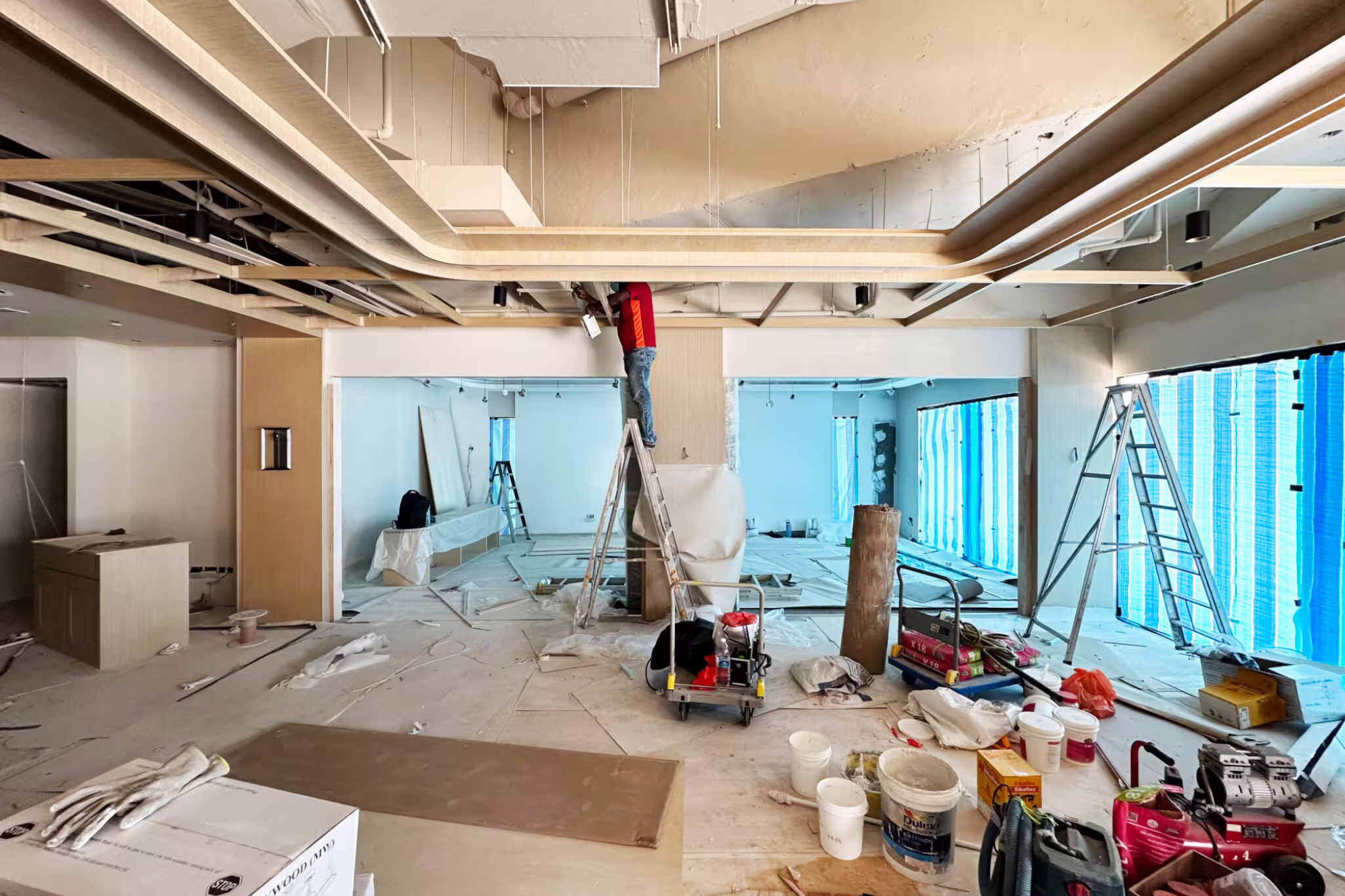 Construction progress photograph of Latitude Bistro showing demolition and preparation works at ONE°15 Marina Sentosa Cove