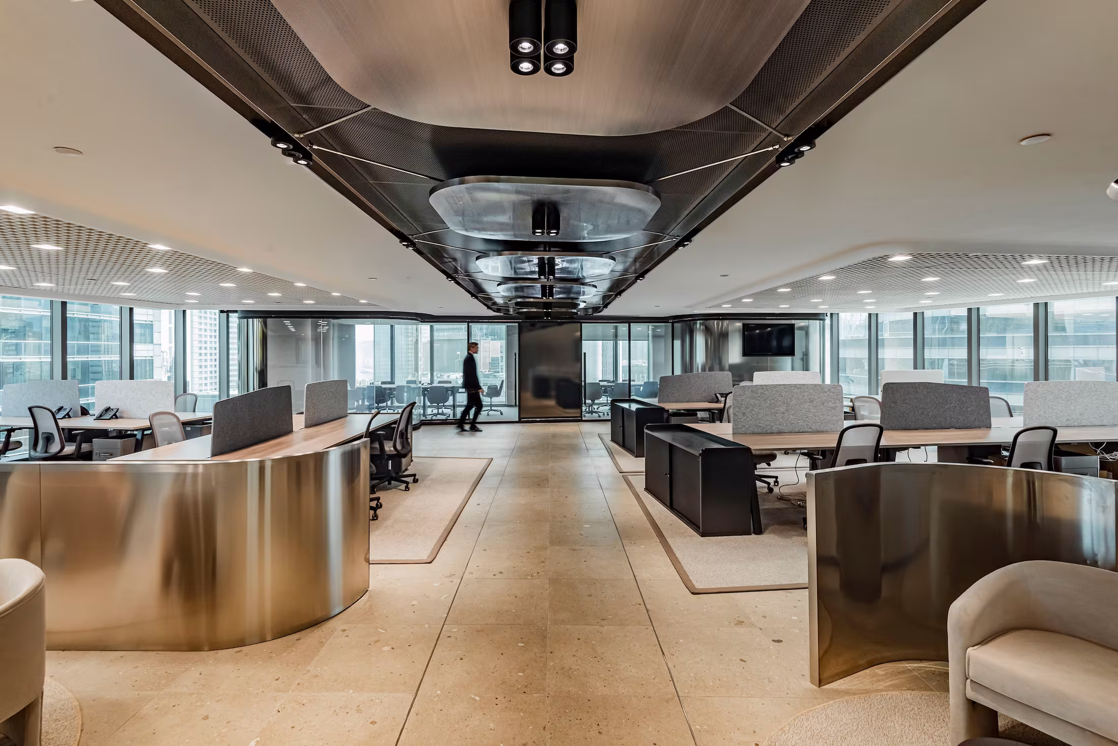 LFCH headquarters open workspace in Sheung Wan Hong Kong with desk clusters, natural light, and uninterrupted skyline views
